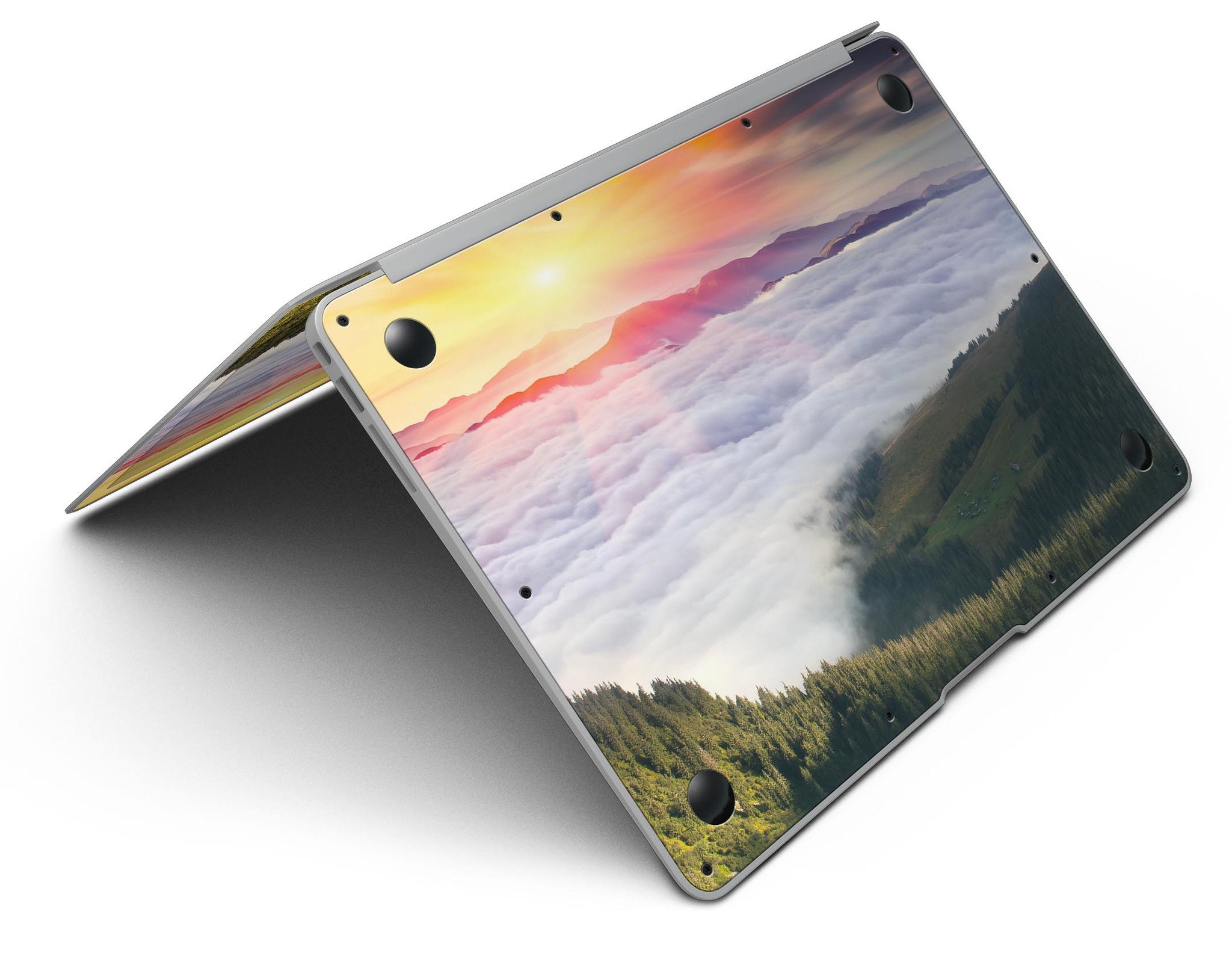 Foggy Mountainside MacBook Air Skin Kit showcasing a scenic mountain design on a sleek laptop surface.