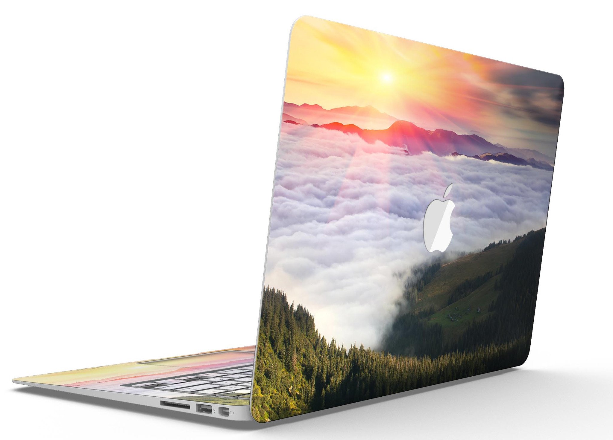 Foggy Mountainside MacBook Air Skin Kit showcasing a scenic mountain design on a sleek laptop surface.