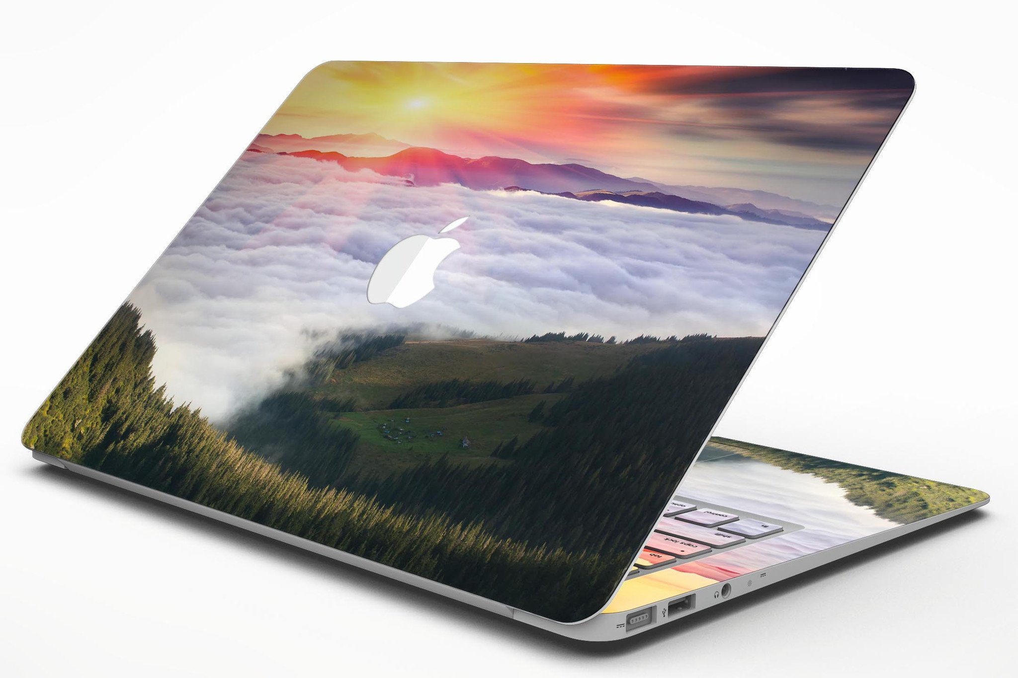 Foggy Mountainside MacBook Air Skin Kit showcasing a scenic mountain design on a sleek laptop surface.