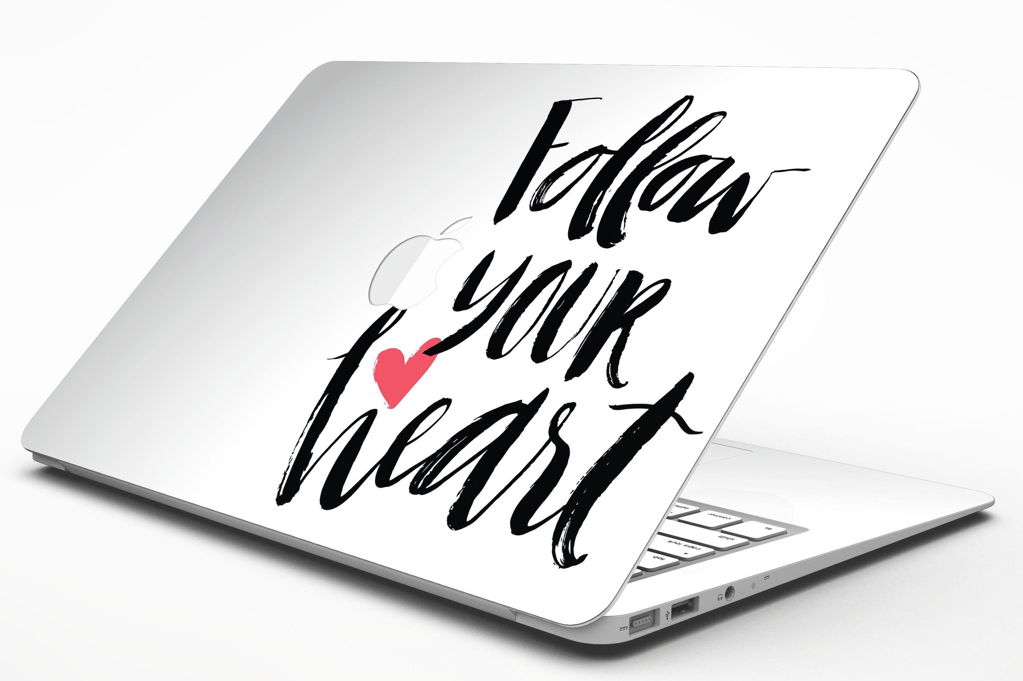 Follow Your Heart V2 MacBook Air Skin Kit showcasing vibrant design and premium vinyl material.