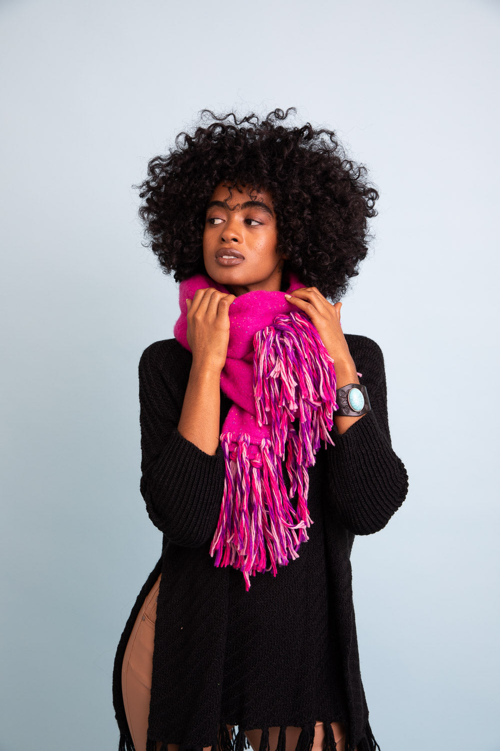 A stylish Frayed Bohemian Flow Scarf with frayed edges, showcasing a soft and lightweight fabric, perfect for chilly days.