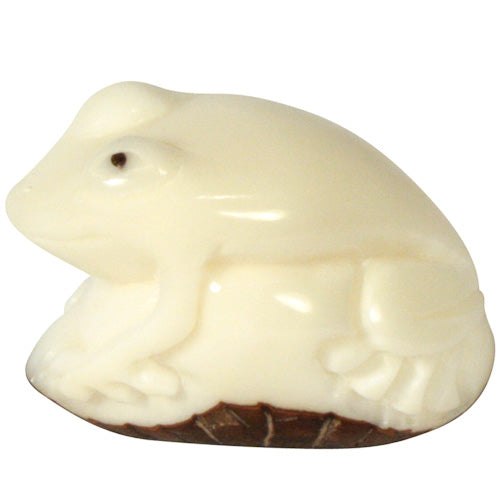 Hand-carved Frog in Relief Tagua Figurine showcasing intricate details and natural colors, made from sustainable tagua nuts.