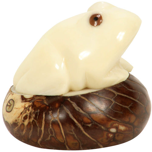 Hand-carved Frog Figurine made from tagua nuts, showcasing natural colors and intricate details, symbolizing eco-friendly craftsmanship.