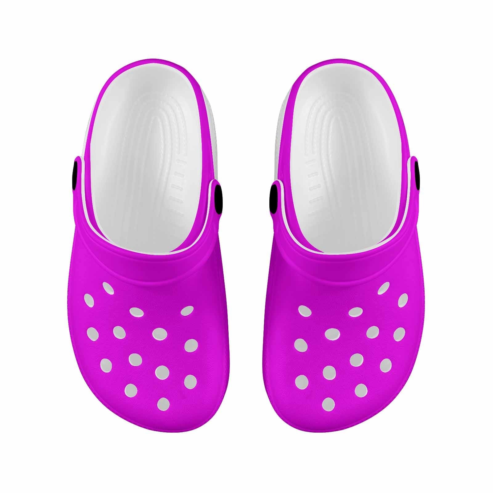 Fuchsia pink clogs for youth, featuring a slip-on design, ventilation ports, and cushioned sole for comfort and style.