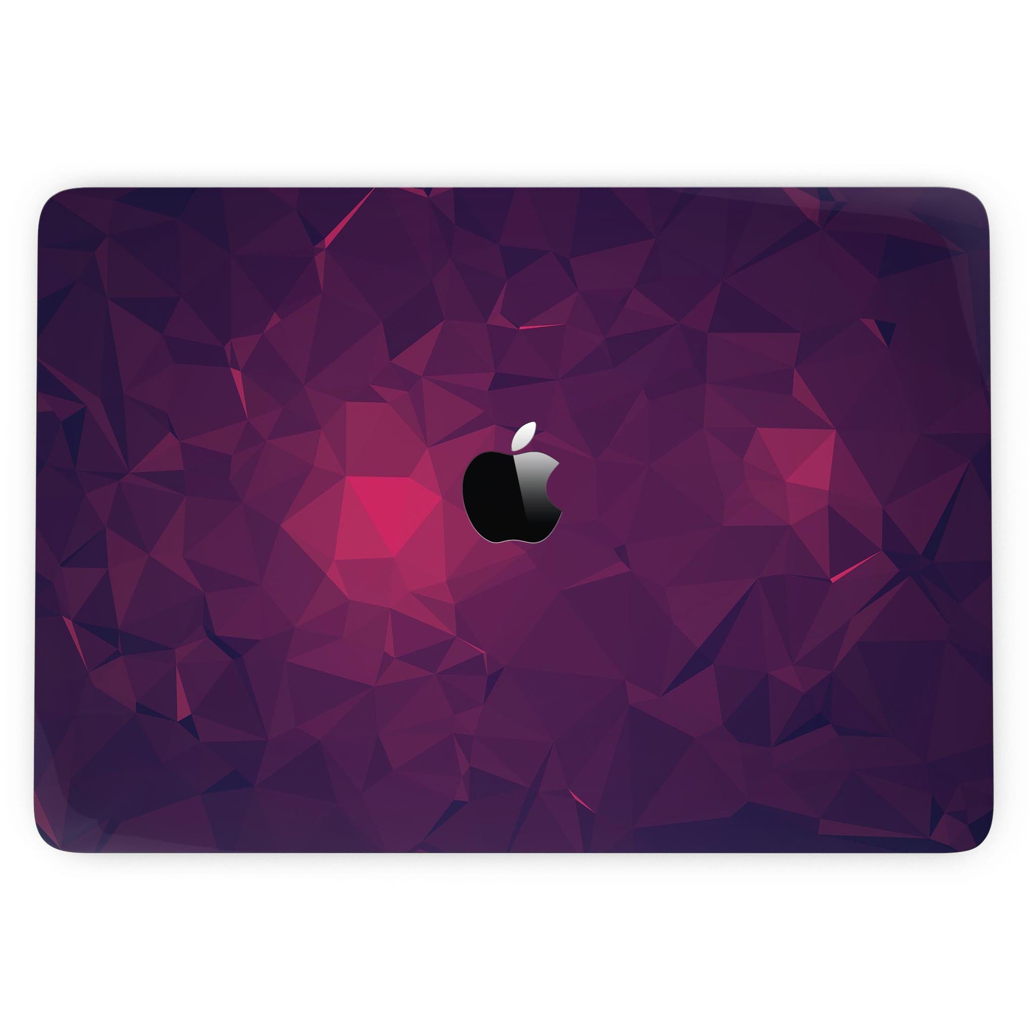 Fuscia Geometric Triangles skin kit for MacBook Pro with Touch Bar, showcasing vibrant geometric patterns on a sleek device.