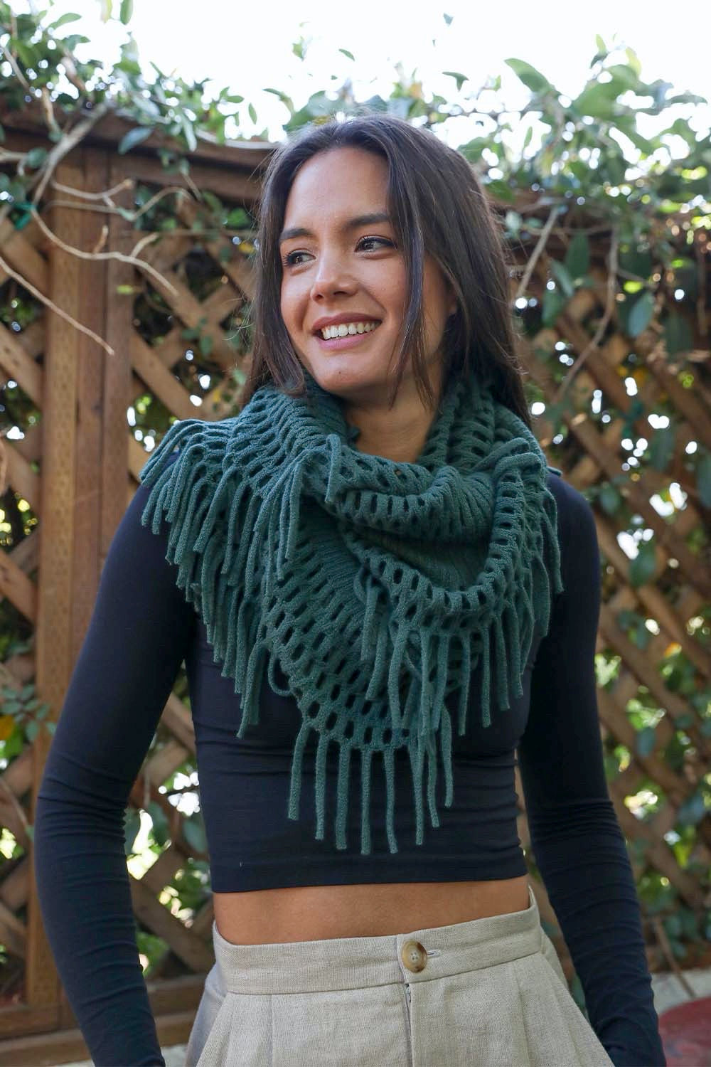 Fuzzy Chenille Tassel Infinity Scarf in various colors, showcasing its soft texture and playful tassels.