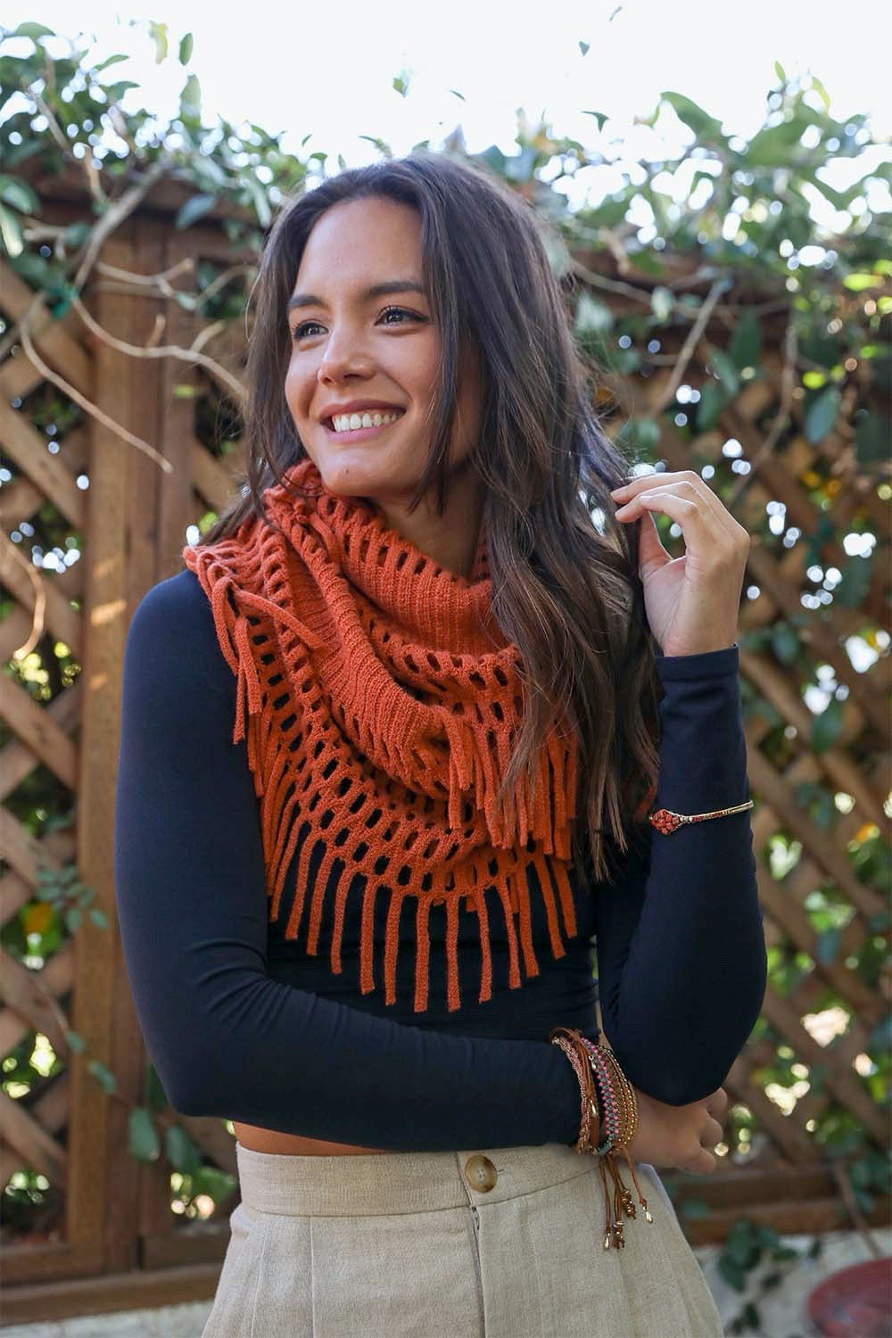 Fuzzy Chenille Tassel Infinity Scarf in various colors, showcasing its soft texture and playful tassels.