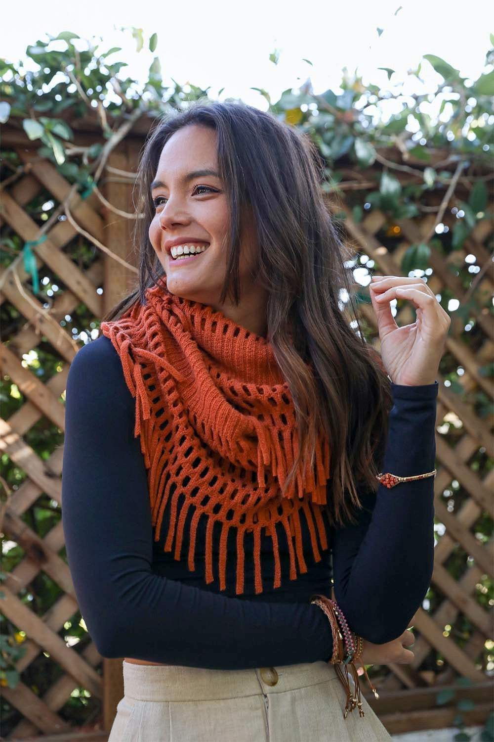 Fuzzy Chenille Tassel Infinity Scarf in various colors, showcasing its soft texture and playful tassels.