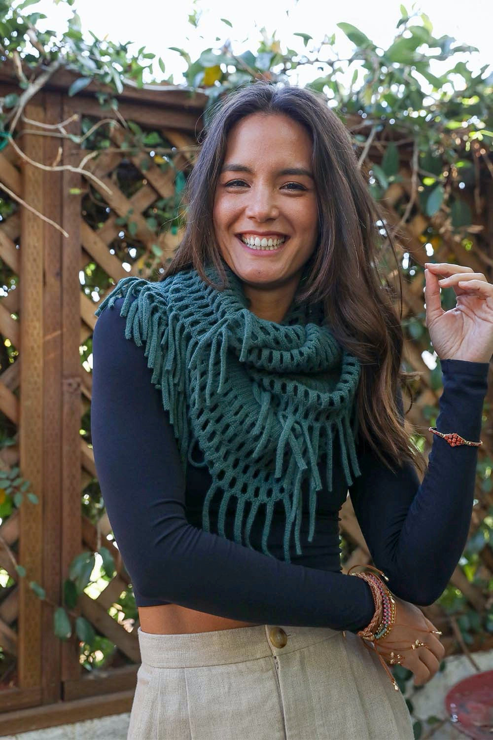 Fuzzy Chenille Tassel Infinity Scarf in various colors, showcasing its soft texture and playful tassels.