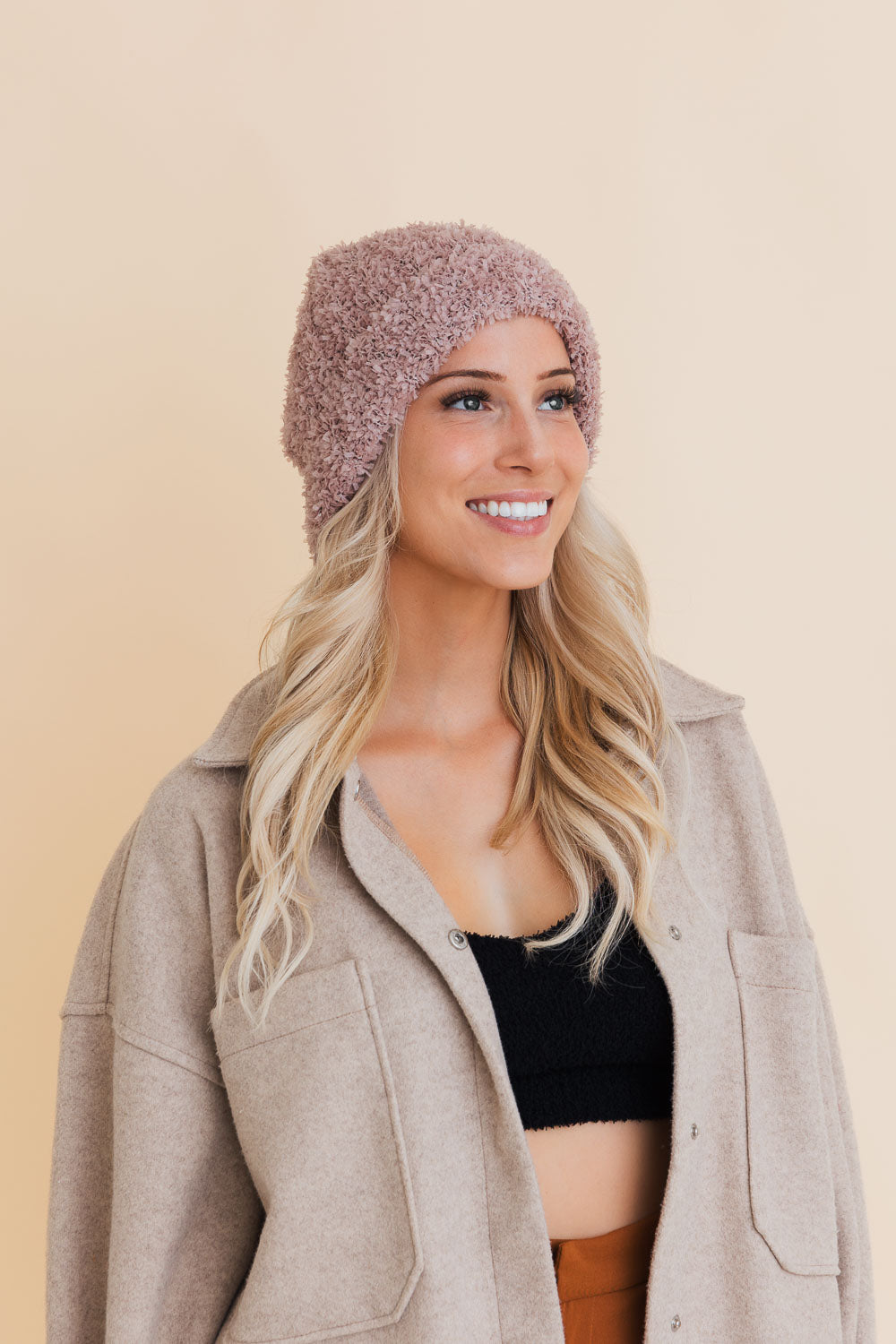 A cozy Fuzzy Fluff Toast Beanie made from soft chenille, perfect for winter wear, showcasing its luxurious texture and stylish design.