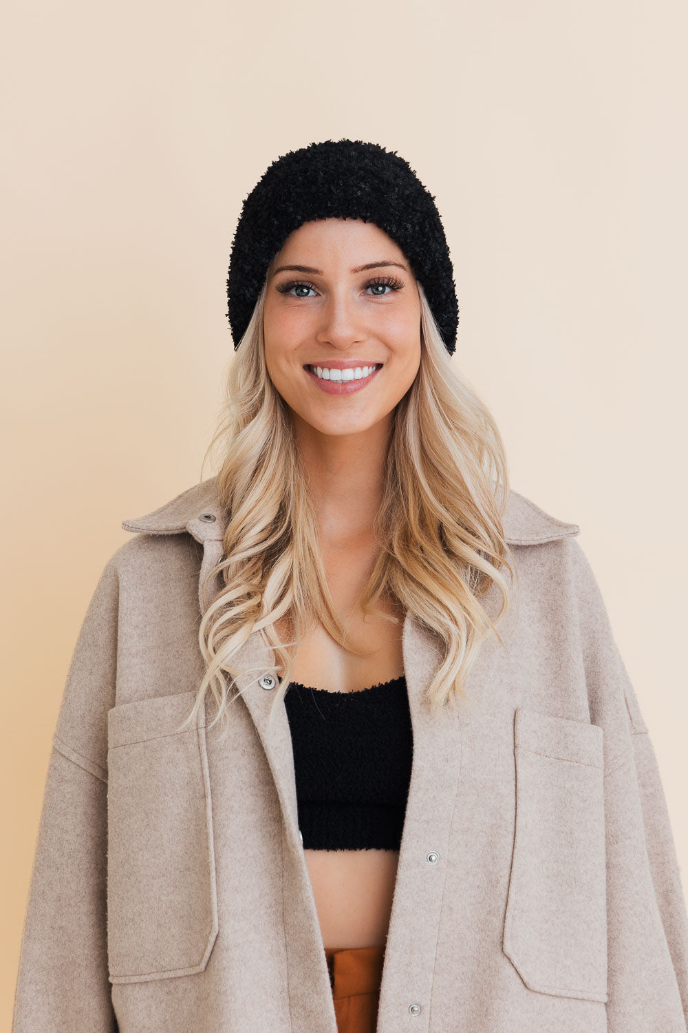 A cozy Fuzzy Fluff Toast Beanie made from soft chenille, perfect for winter wear, showcasing its luxurious texture and stylish design.