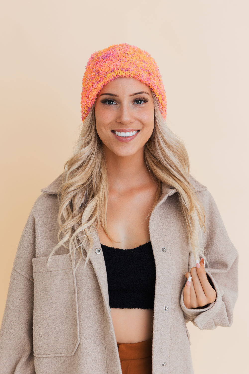 A cozy Fuzzy Fluff Toast Beanie made from soft chenille, perfect for winter wear, showcasing its luxurious texture and stylish design.