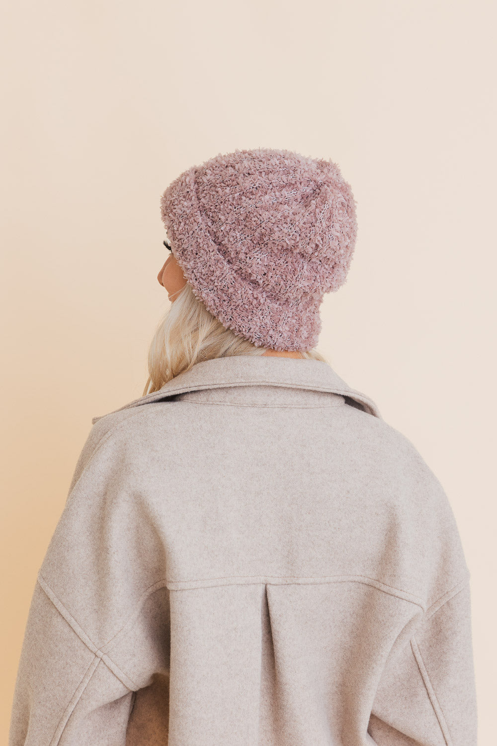 A cozy Fuzzy Fluff Toast Beanie made from soft chenille, perfect for winter wear, showcasing its luxurious texture and stylish design.