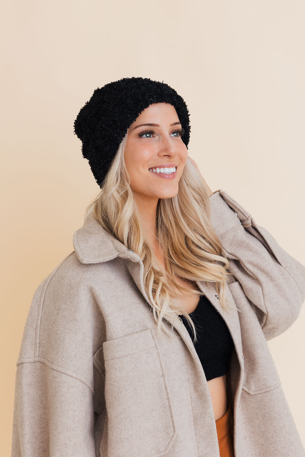 A cozy Fuzzy Fluff Toast Beanie made from soft chenille, perfect for winter wear, showcasing its luxurious texture and stylish design.