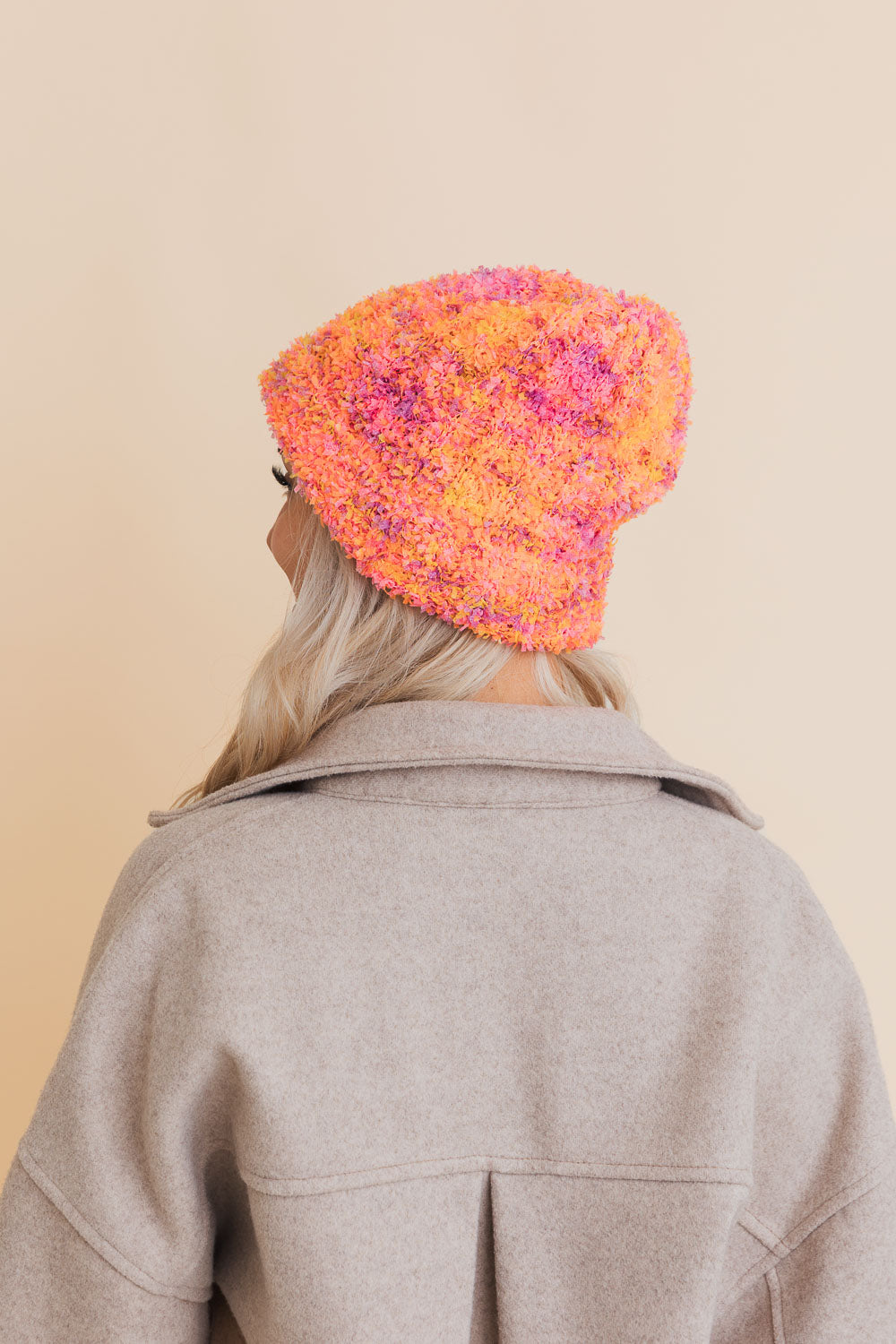 A cozy Fuzzy Fluff Toast Beanie made from soft chenille, perfect for winter wear, showcasing its luxurious texture and stylish design.