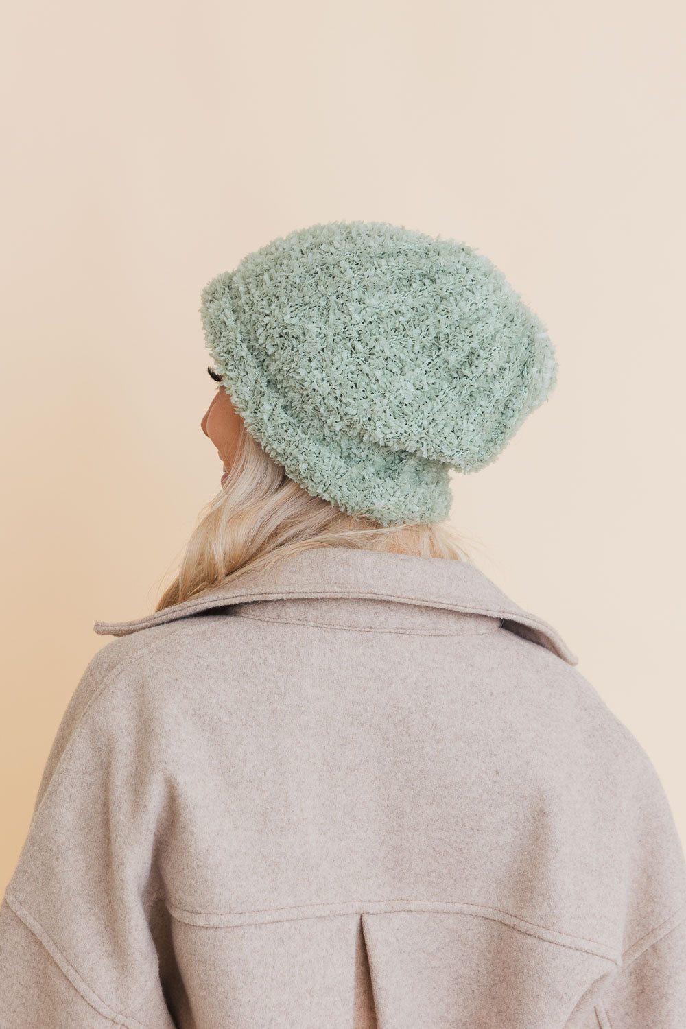 A cozy Fuzzy Fluff Toast Beanie made from soft chenille, perfect for winter wear, showcasing its luxurious texture and stylish design.