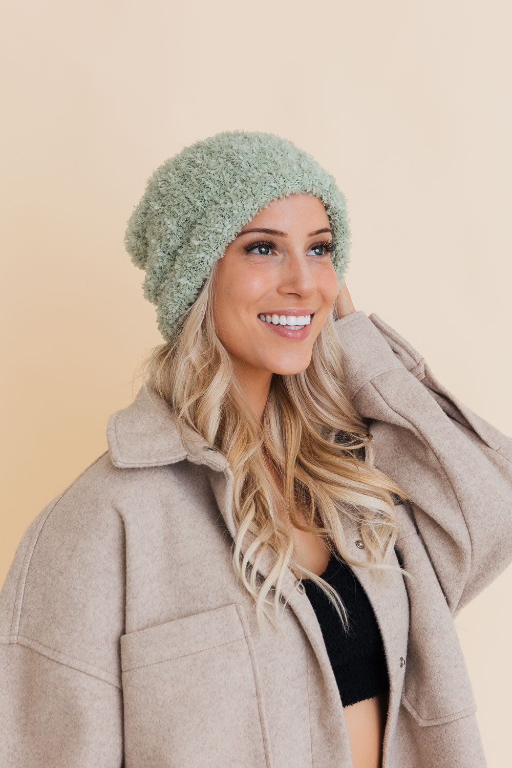 A cozy Fuzzy Fluff Toast Beanie made from soft chenille, perfect for winter wear, showcasing its luxurious texture and stylish design.