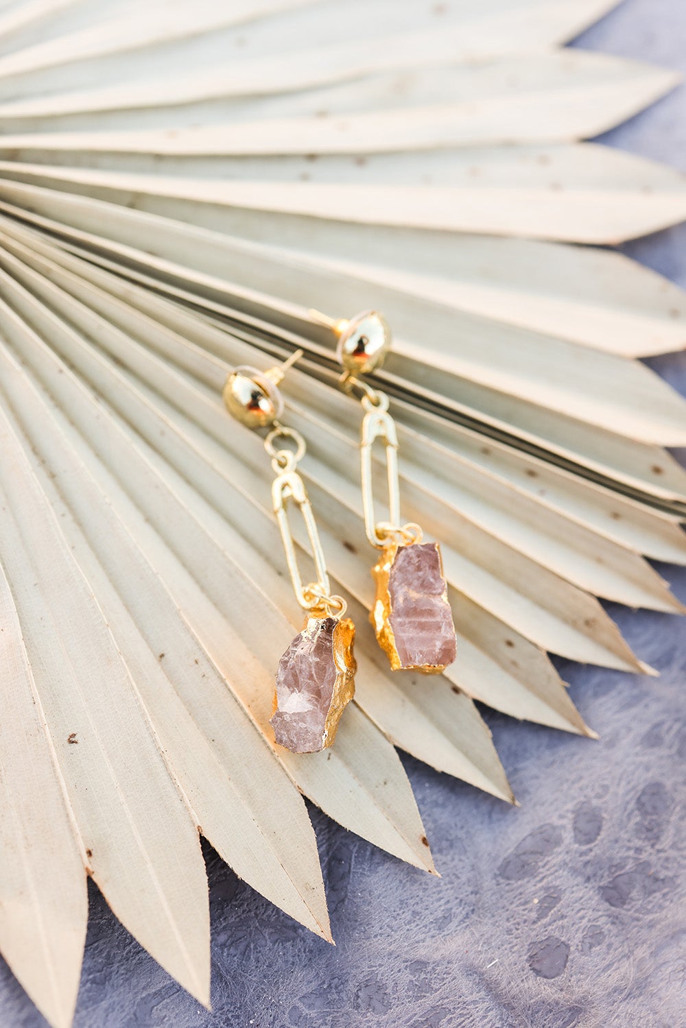 Elegant Gem Stone Fashion Earrings featuring a pink gemstone in a gold setting, perfect for special occasions.