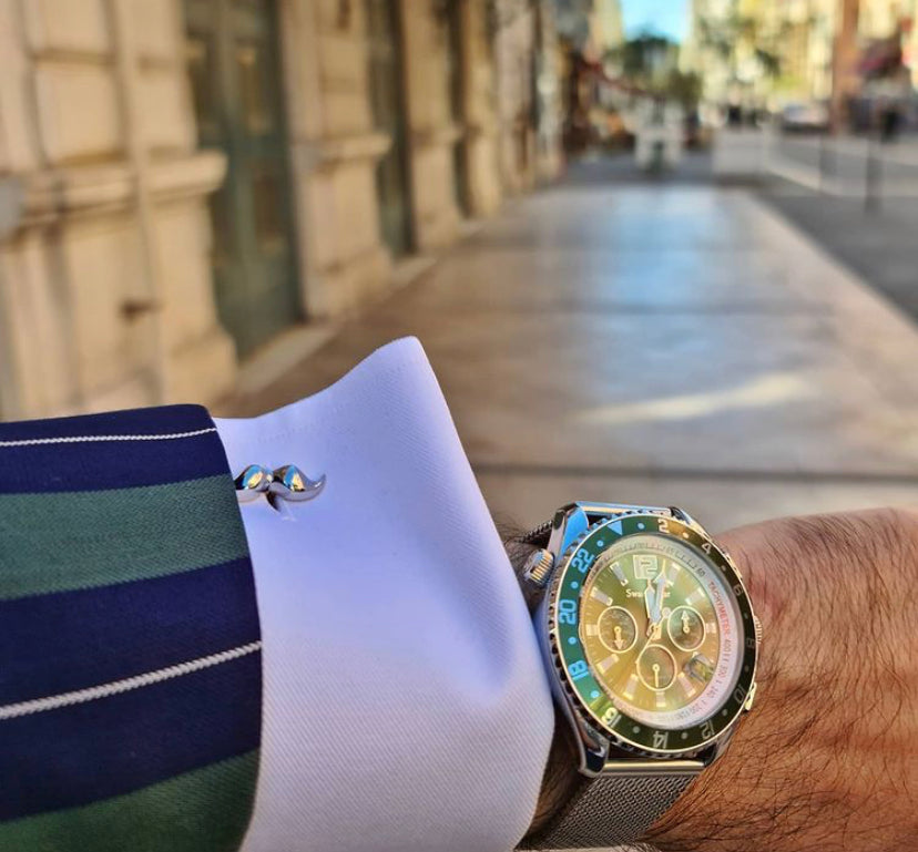 Polished silver cufflinks featuring a unique moustache design, perfect for stylish gentlemen.