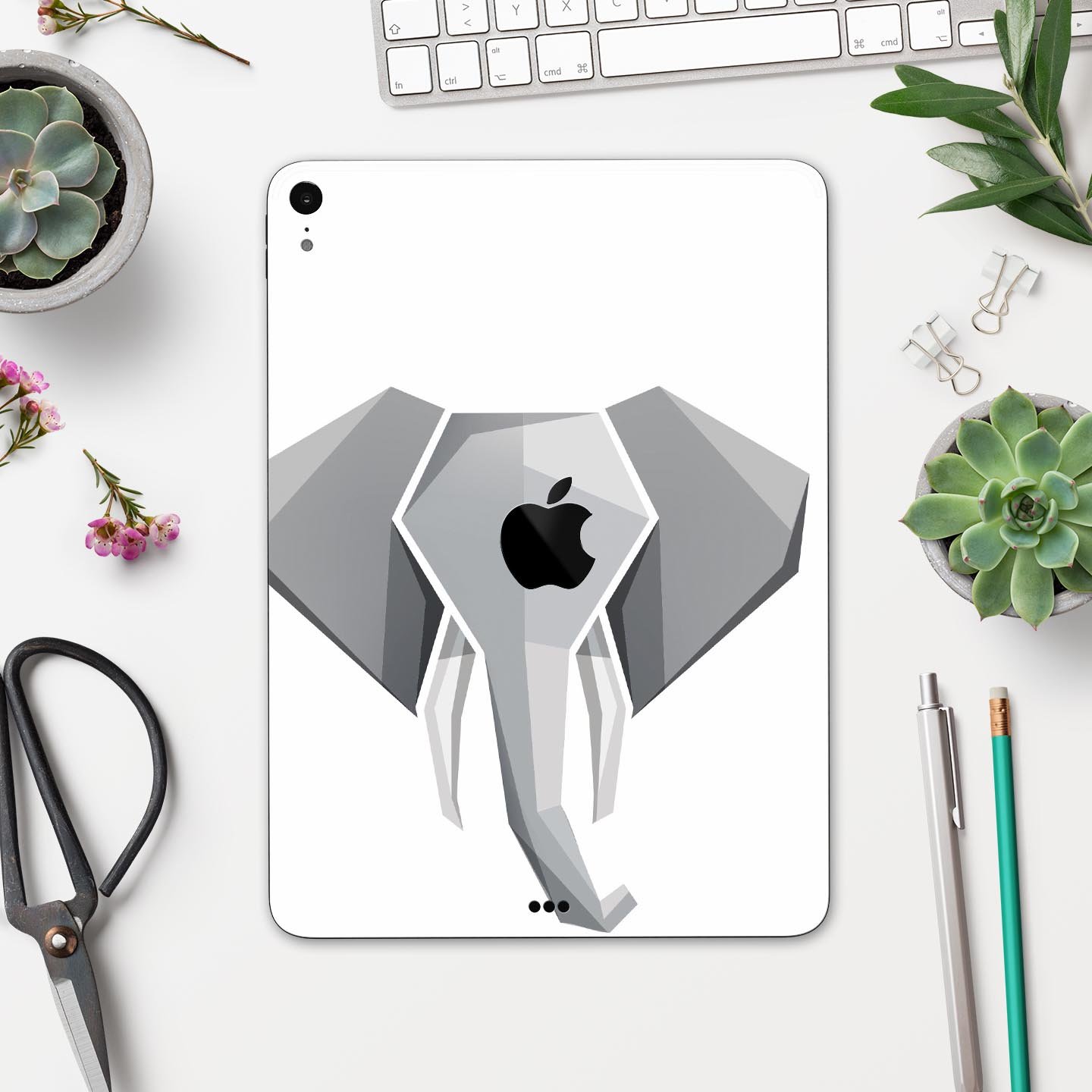 Geometric Elephant full body skin decal for Apple iPad Pro, showcasing vibrant colors and intricate design.