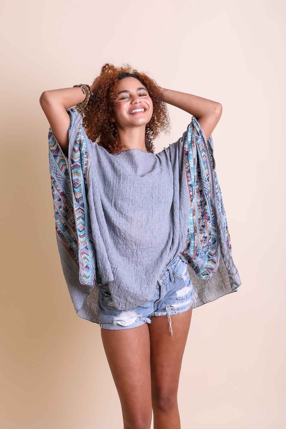 Geometric Embroidered Tunic featuring intricate patterns, perfect for layering or beach cover-ups.