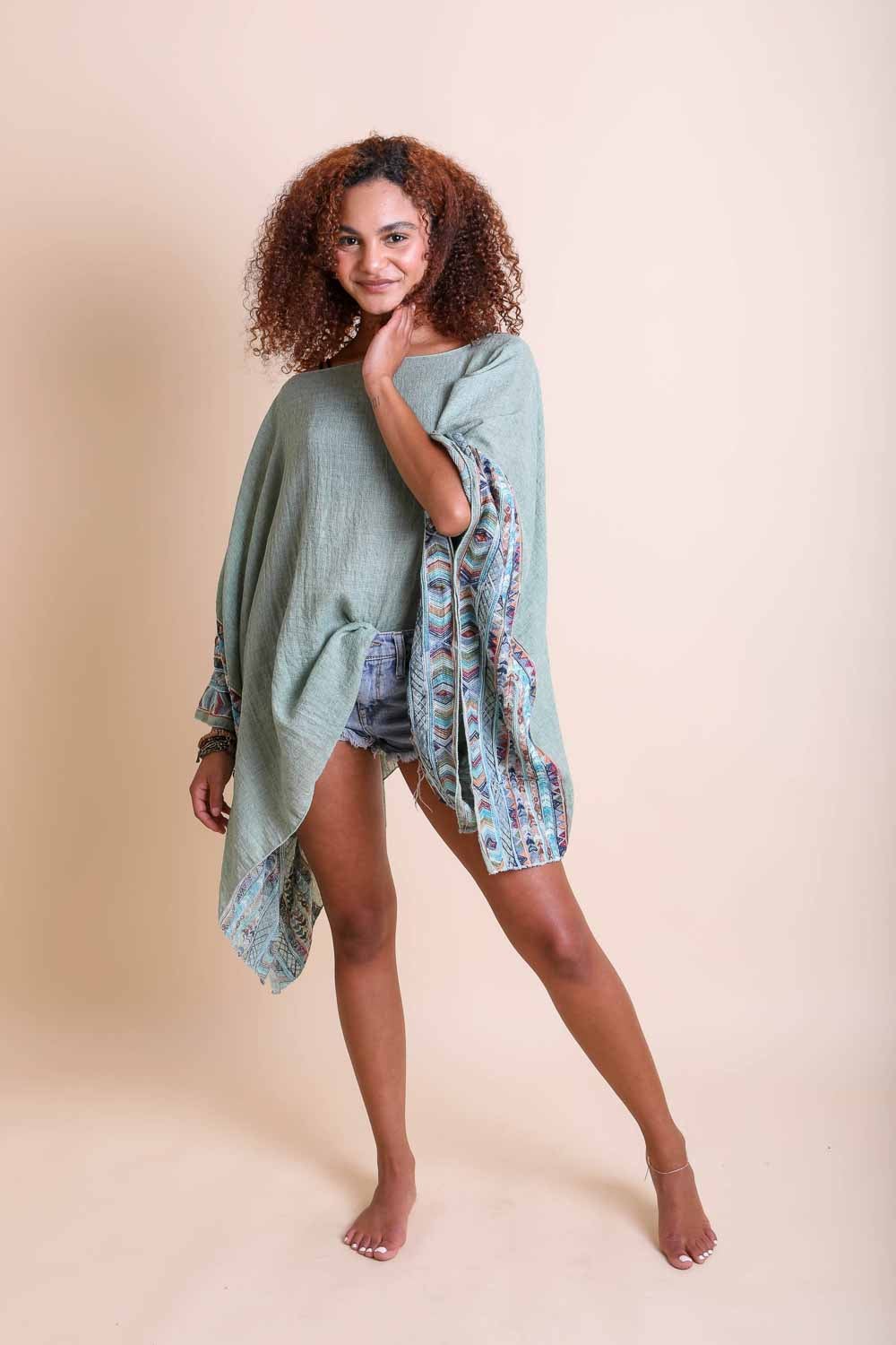 Geometric Embroidered Tunic featuring intricate patterns, perfect for layering or beach cover-ups.