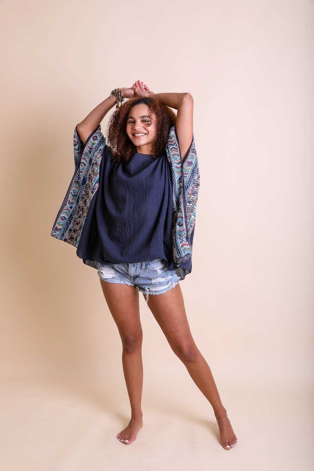 Geometric Embroidered Tunic featuring intricate patterns, perfect for layering or beach cover-ups.