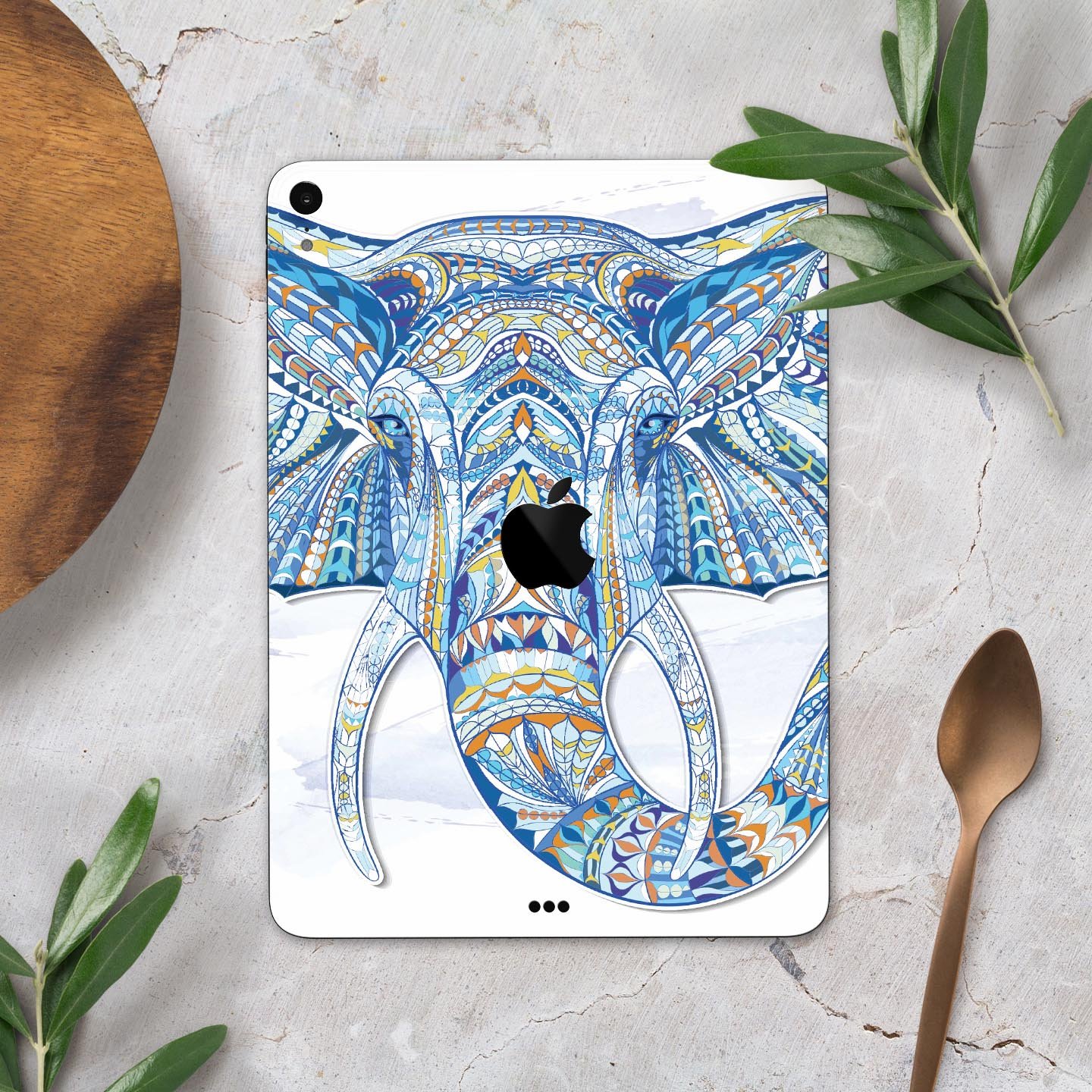 Geometric Sacred Elephant skin decal for Apple iPad, showcasing vibrant colors and intricate design on a sleek surface.