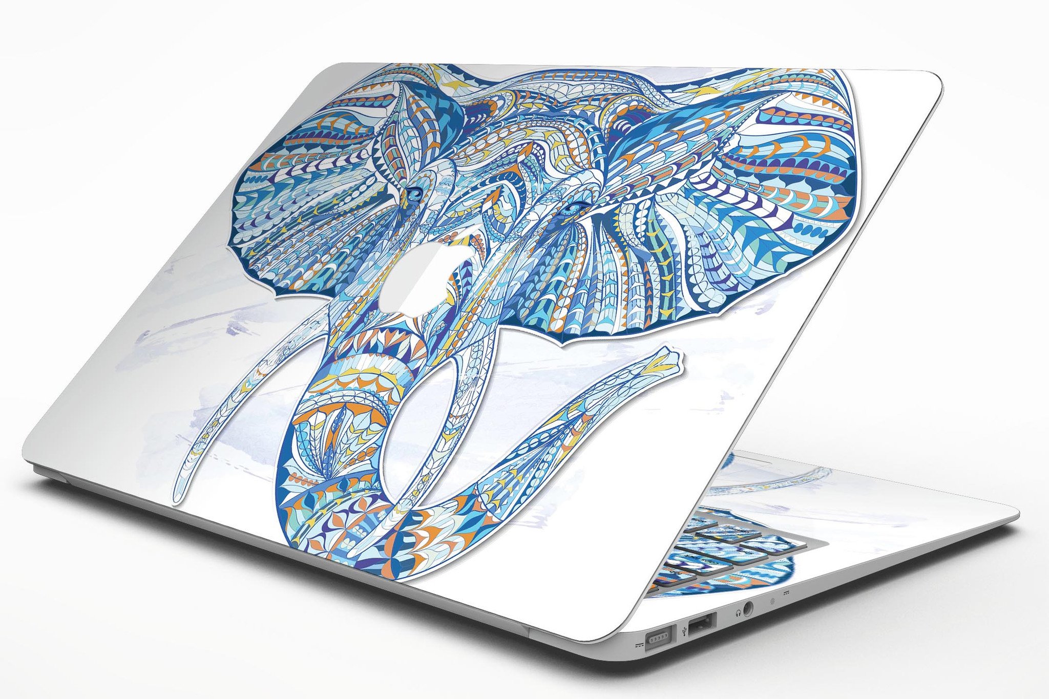 Geometric Sacred Elephant MacBook Air Skin Kit showcasing vibrant geometric patterns on a sleek laptop surface.