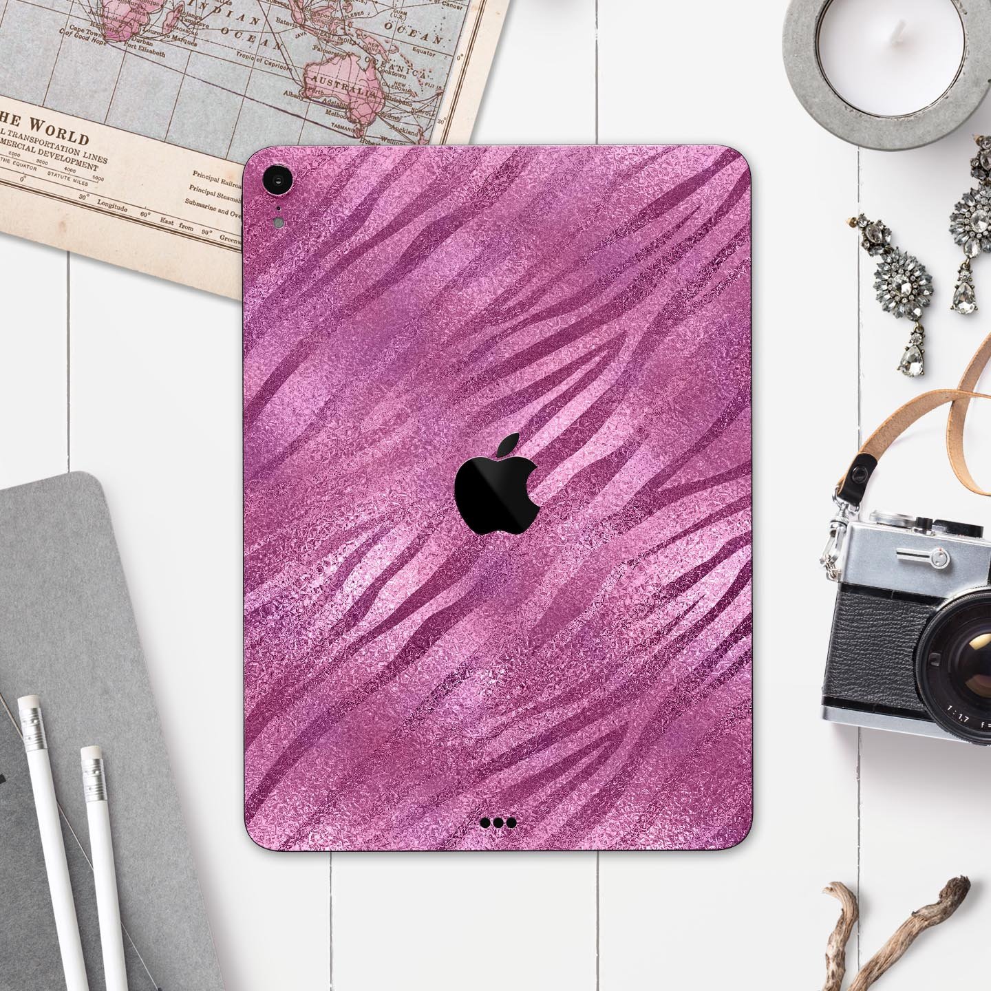 Glamorous Pink Toned Zebra skin decal for Apple iPad, showcasing a stylish zebra pattern with a glossy finish.