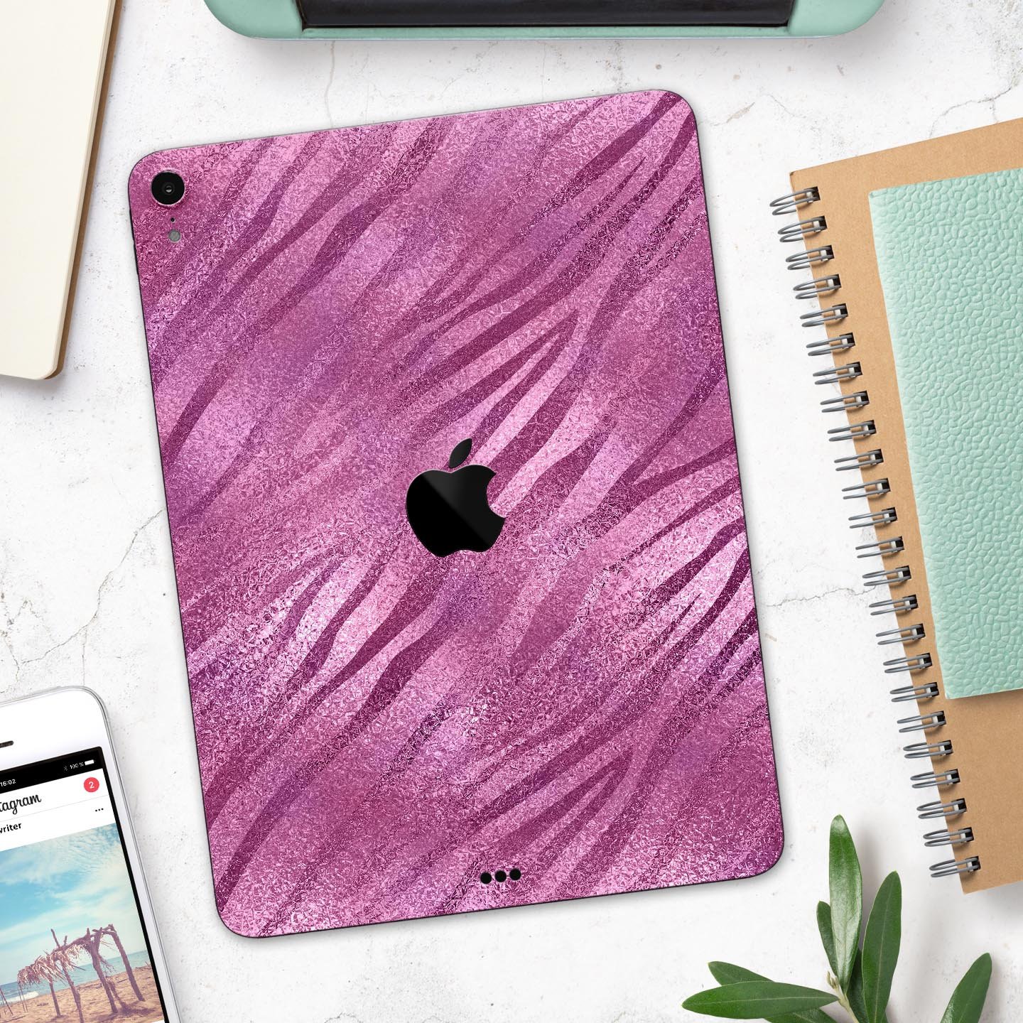 Glamorous Pink Toned Zebra skin decal for Apple iPad, showcasing a stylish zebra pattern with a glossy finish.