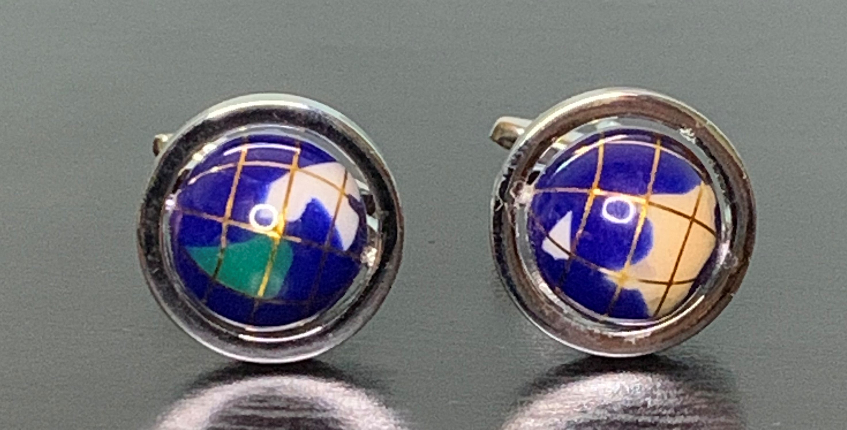 Elegant Global Rogue Cufflinks showcasing a unique design inspired by global adventures, perfect for stylish gentlemen.