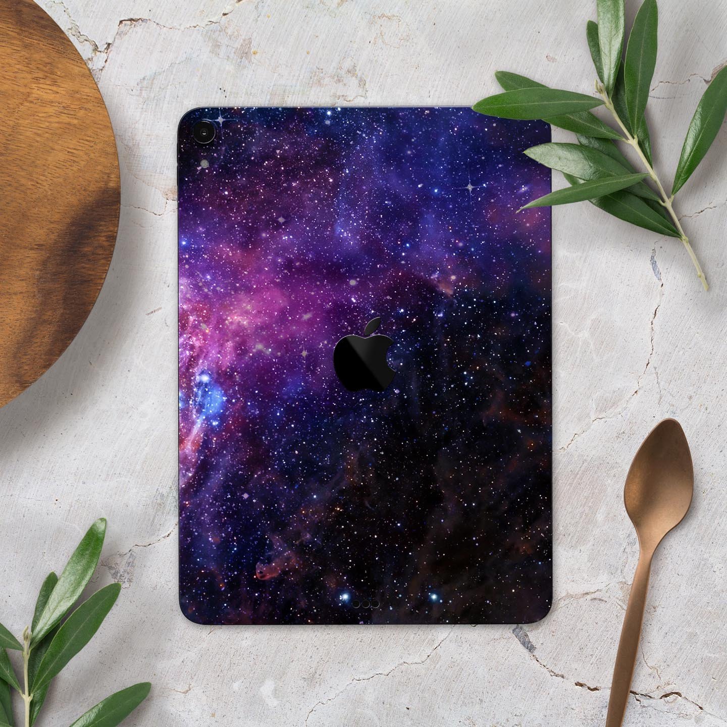 Glowing Deep Space skin decal for Apple iPad Pro, showcasing vibrant cosmic design and ultra-thin protection.