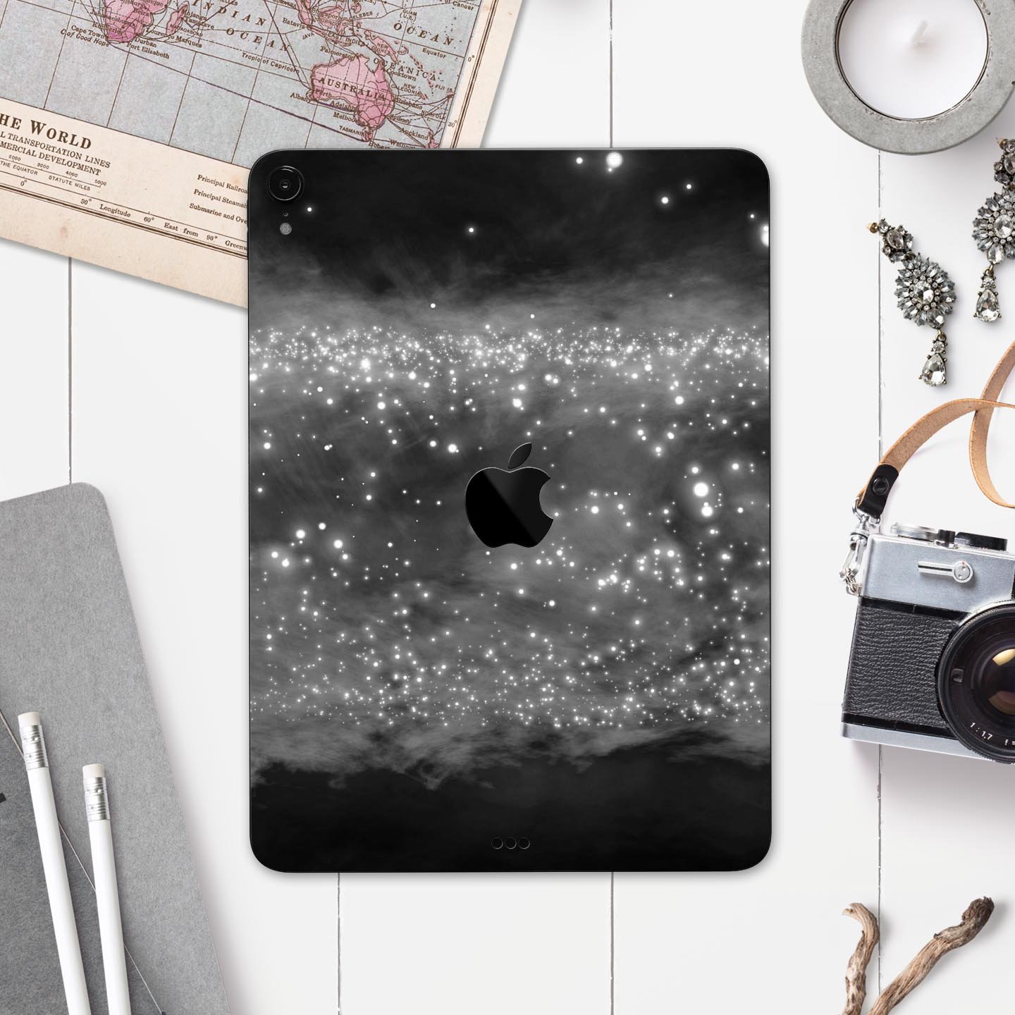 Glowing Grayscale Orbs of Light skin decal for Apple devices, showcasing a stylish design with premium finish.