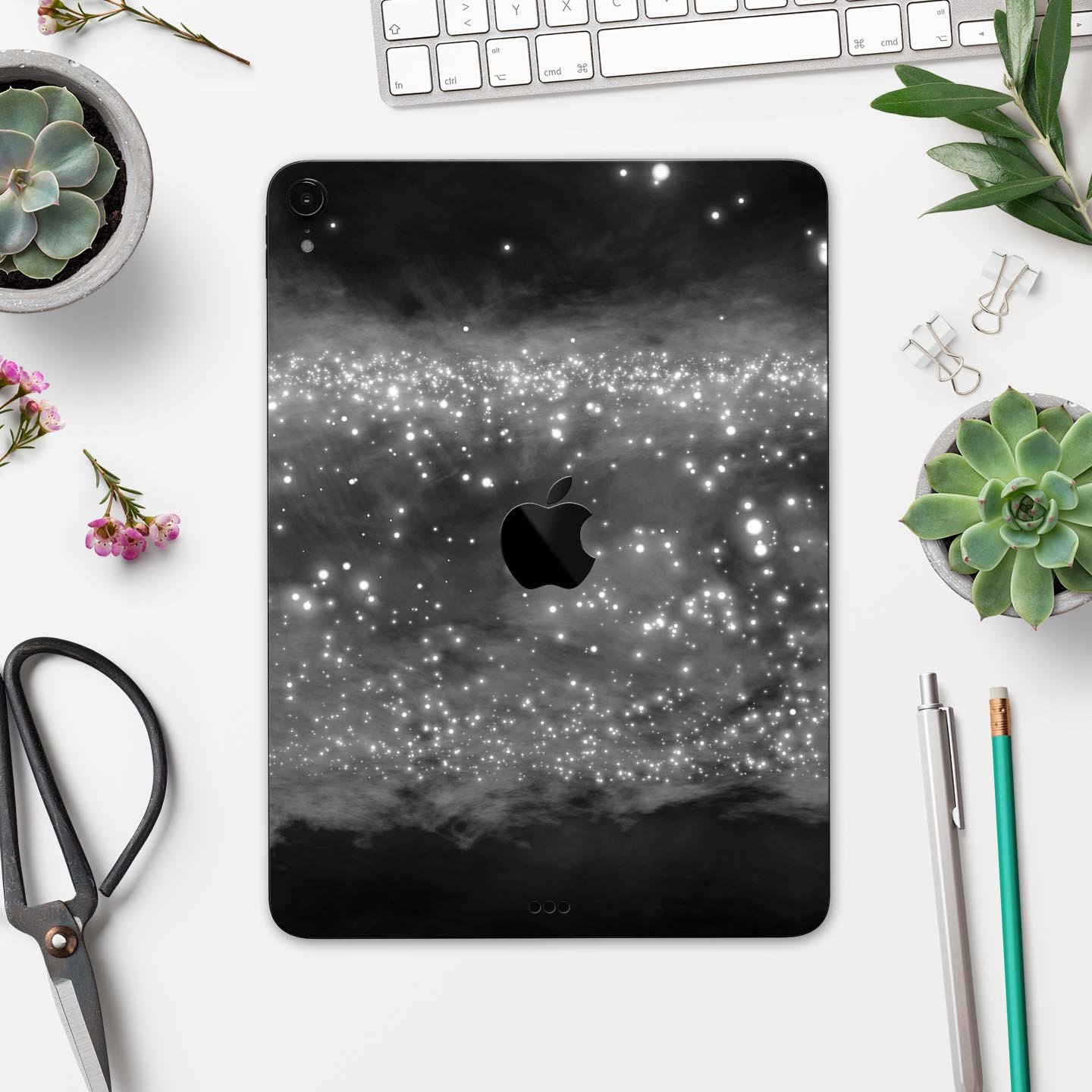 Glowing Grayscale Orbs of Light skin decal for Apple devices, showcasing a stylish design with premium finish.