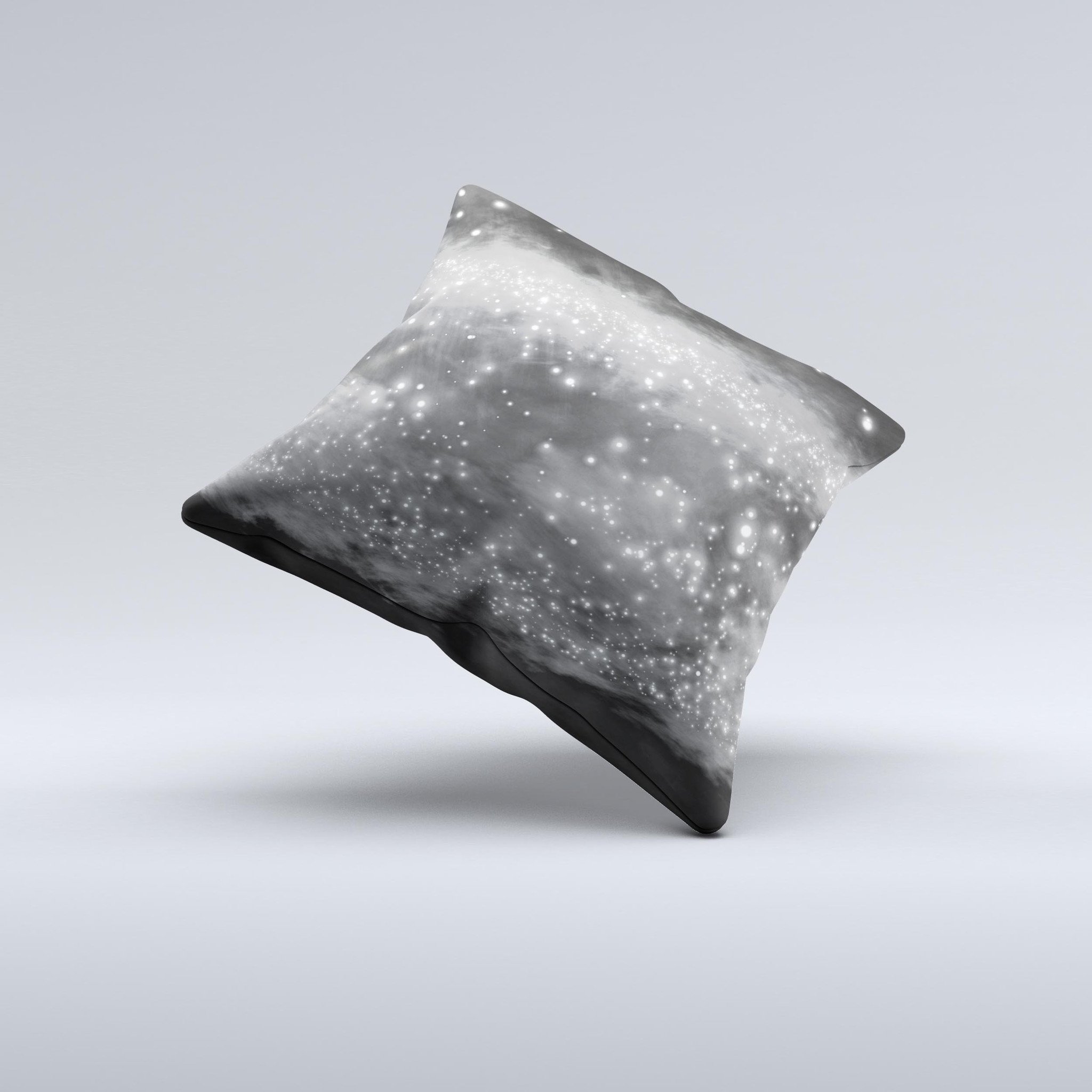 A decorative throw pillow featuring glowing grayscale orbs of light, handcrafted with high-quality fabric and unique designs.