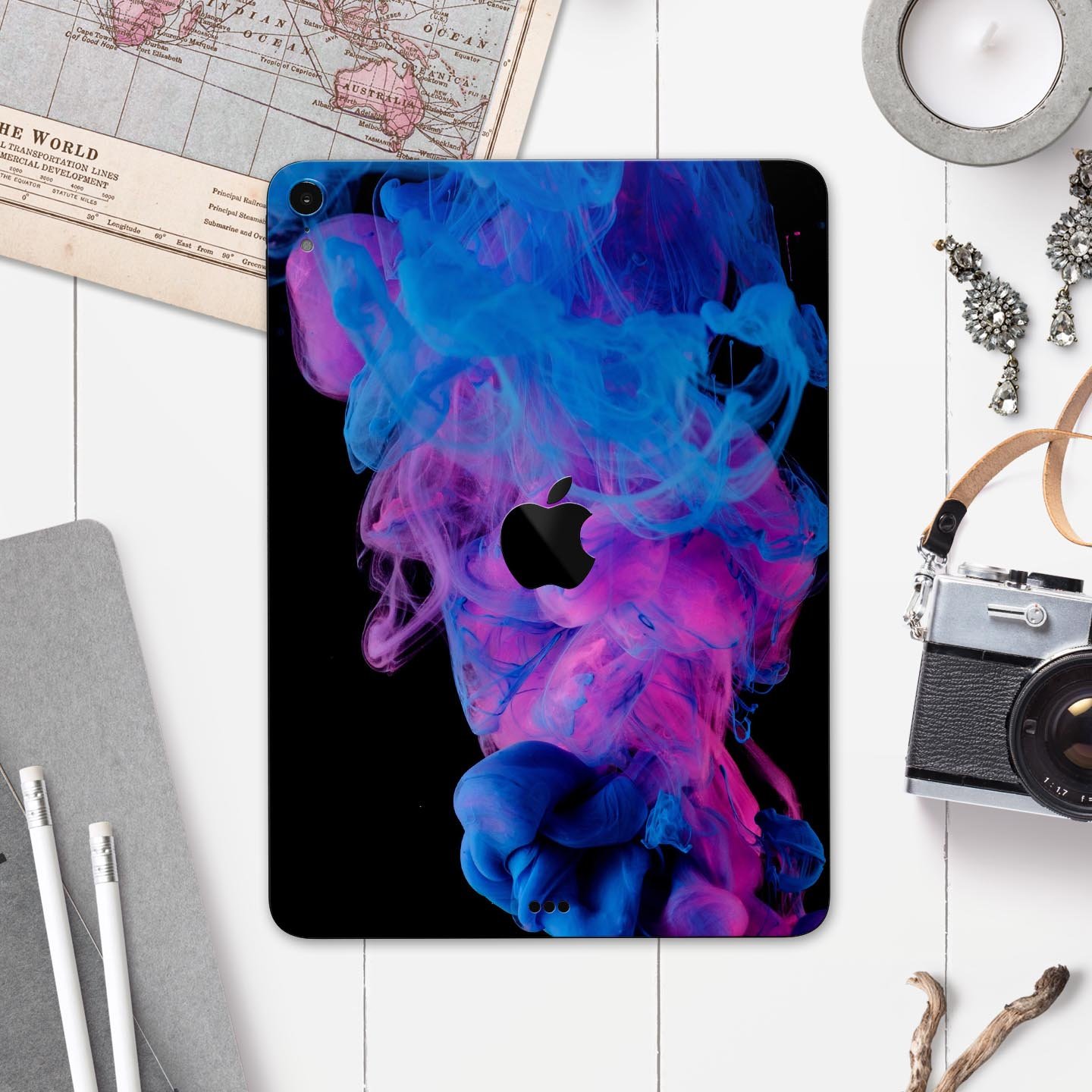 Glowing Pink and Blue CloudSwirl skin decal for Apple devices, showcasing vibrant colors and a sleek design.