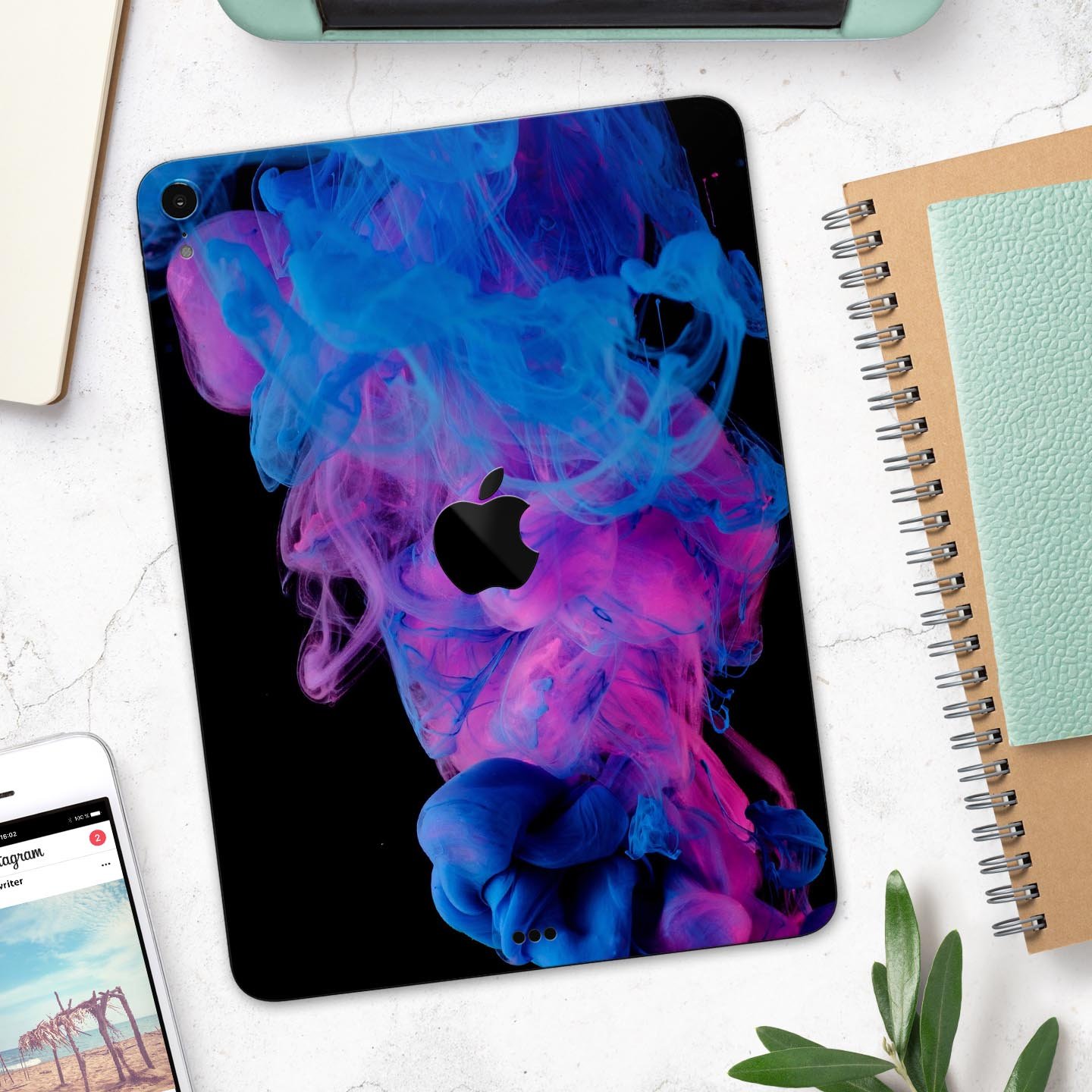 Glowing Pink and Blue CloudSwirl skin decal for Apple devices, showcasing vibrant colors and a sleek design.