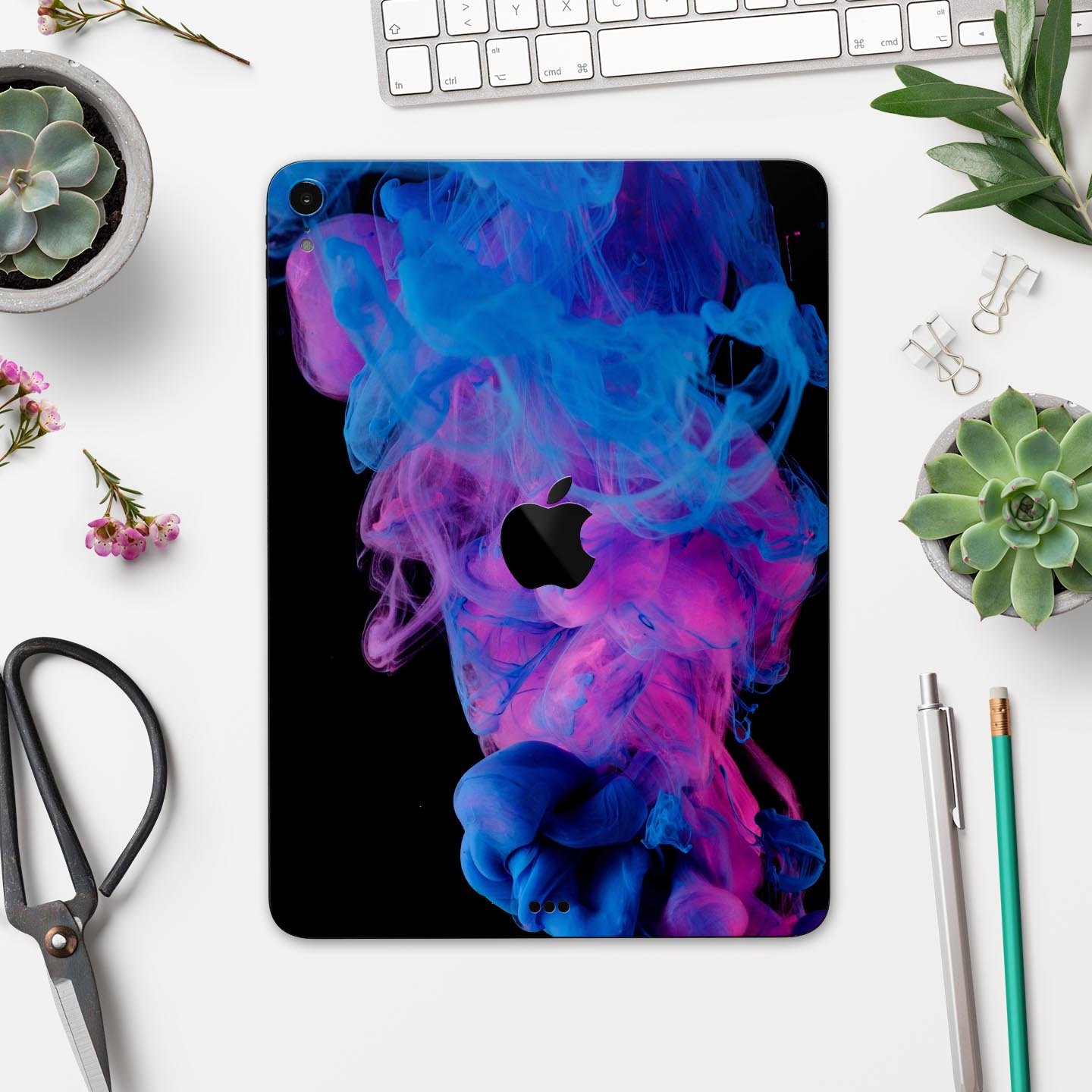 Glowing Pink and Blue CloudSwirl skin decal for Apple devices, showcasing vibrant colors and a sleek design.