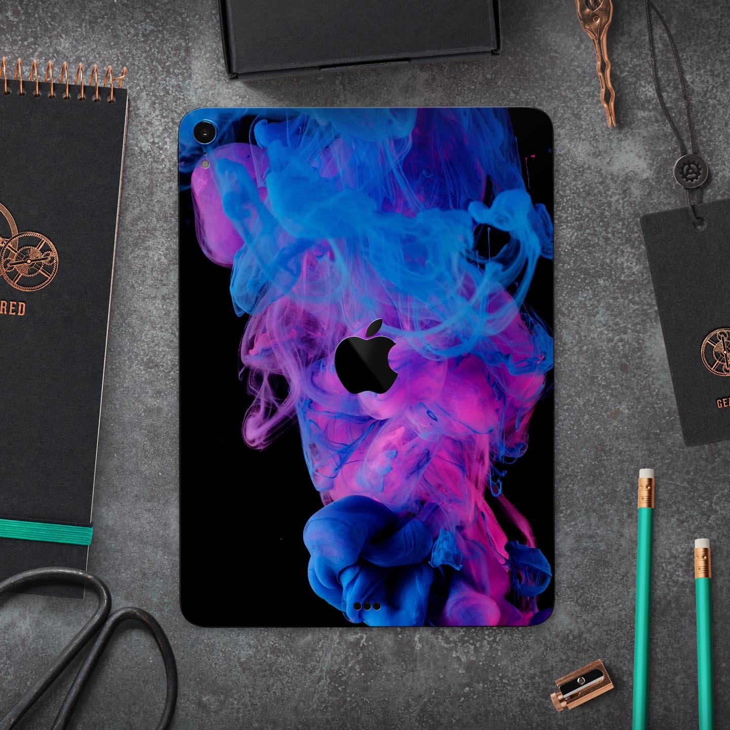 Glowing Pink and Blue CloudSwirl skin decal for Apple devices, showcasing vibrant colors and a sleek design.