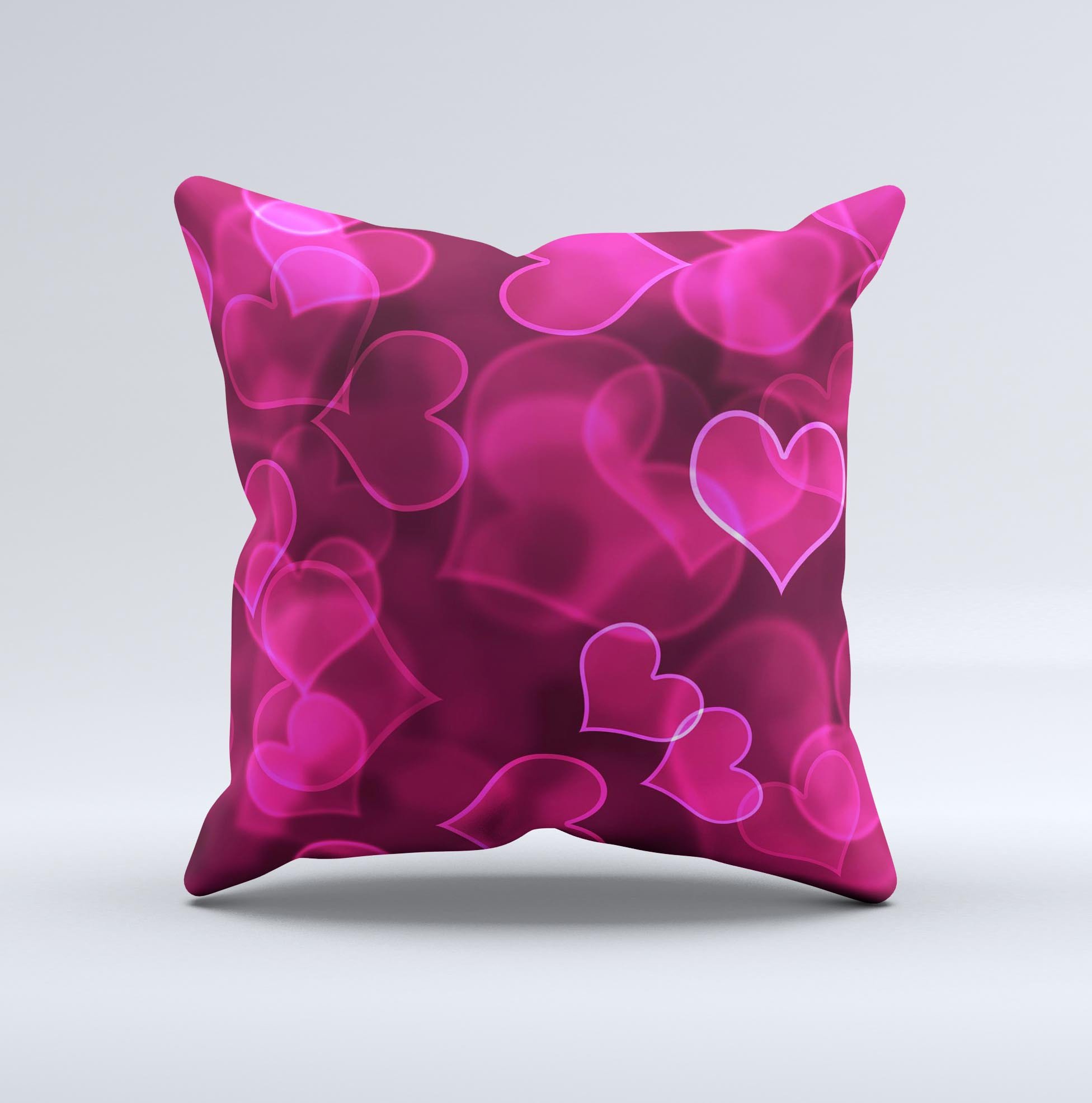 Glowing Pink Outlined Hearts decorative throw pillow with a soft poly/cotton fabric and plush filling, showcasing a unique handcrafted design.