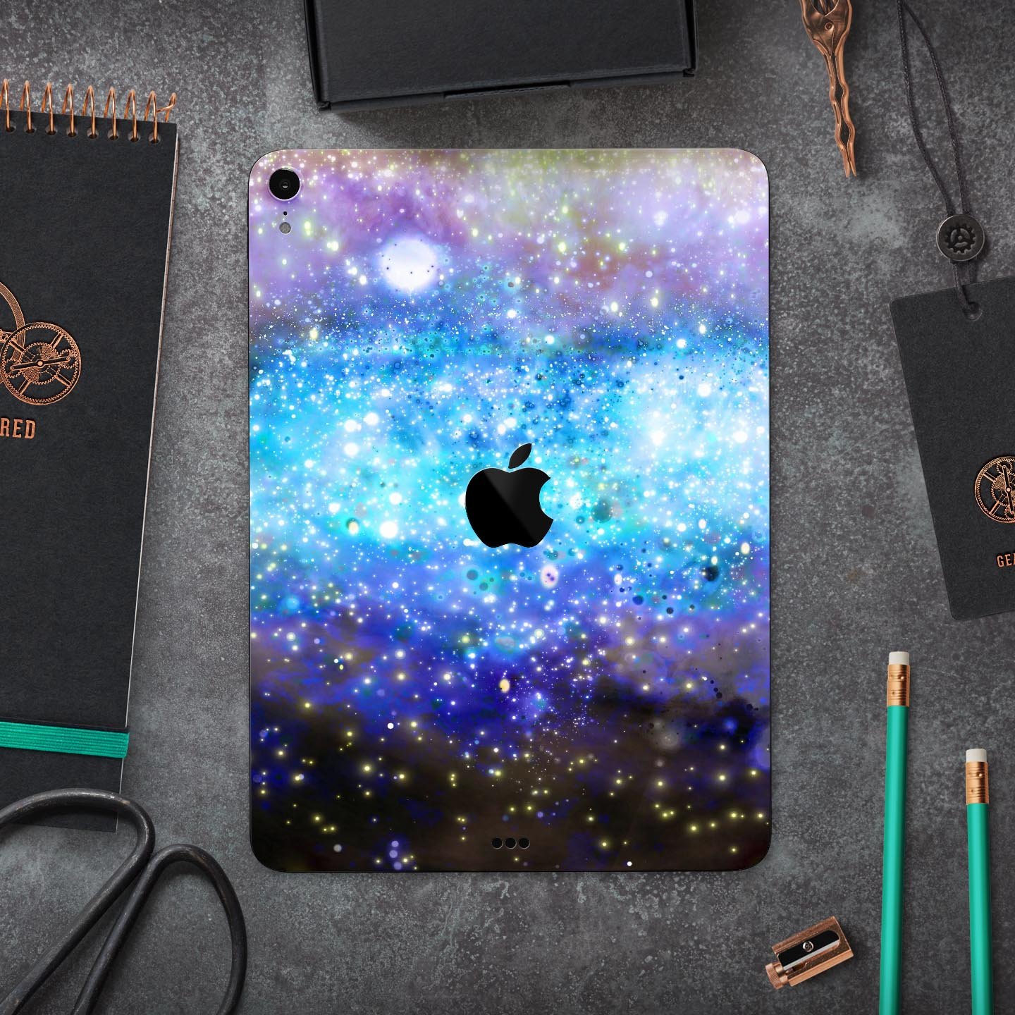 Glowing Space Texture skin decal for Apple iPad Pro, showcasing vibrant colors and a sleek design.