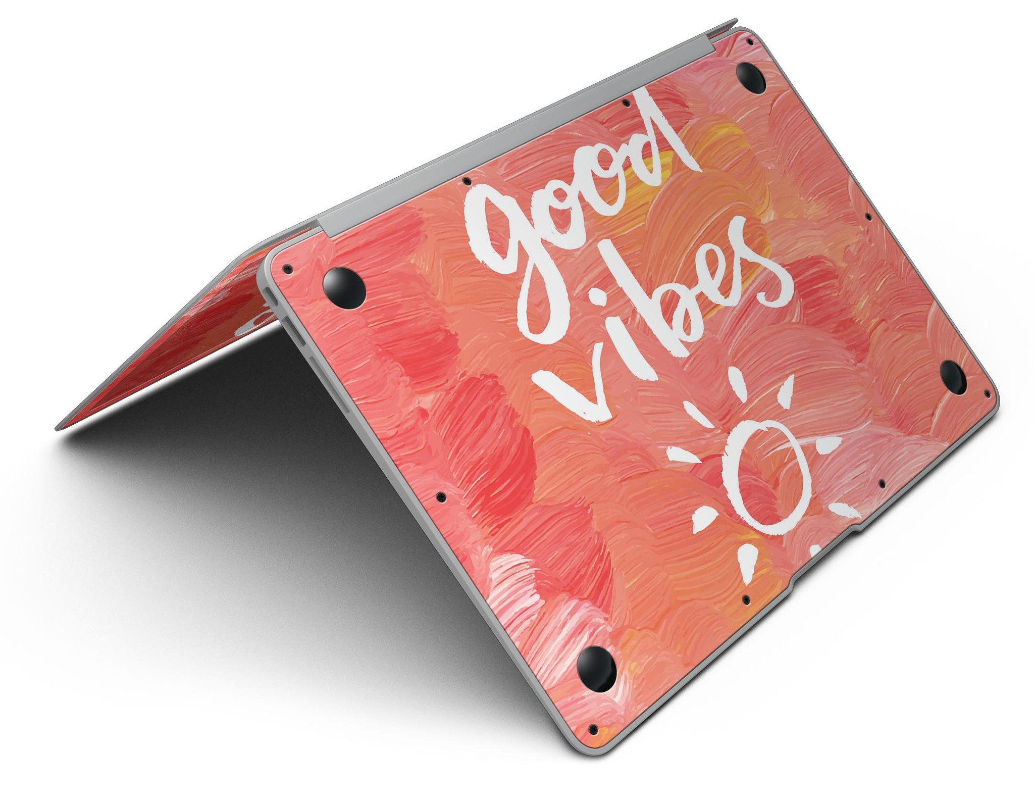 Good Vibes MacBook Air Skin Kit showcasing vibrant designs and textures, perfect for personalizing your device.