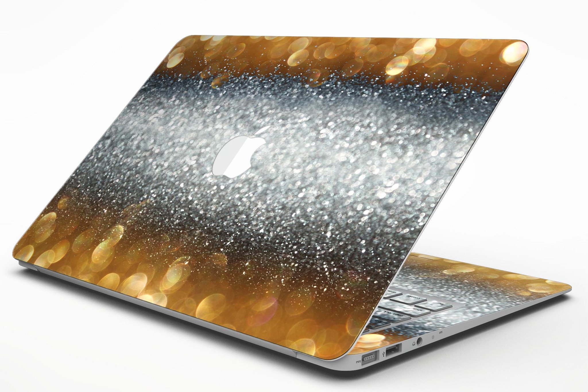 Gold and Silver Unfocused Orbs of Glowing Light skin kit applied to a MacBook Air, showcasing its vibrant design and sleek finish.