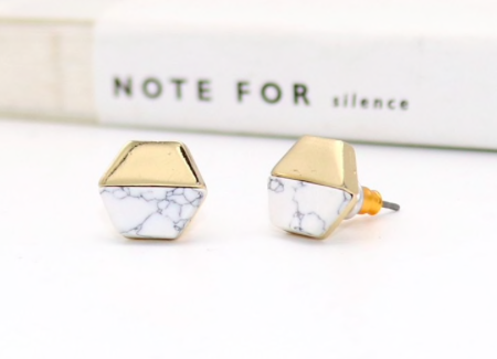 Gold and white marble stud earrings in hexagon shape, showcasing a modern and elegant design, perfect for sensitive ears.