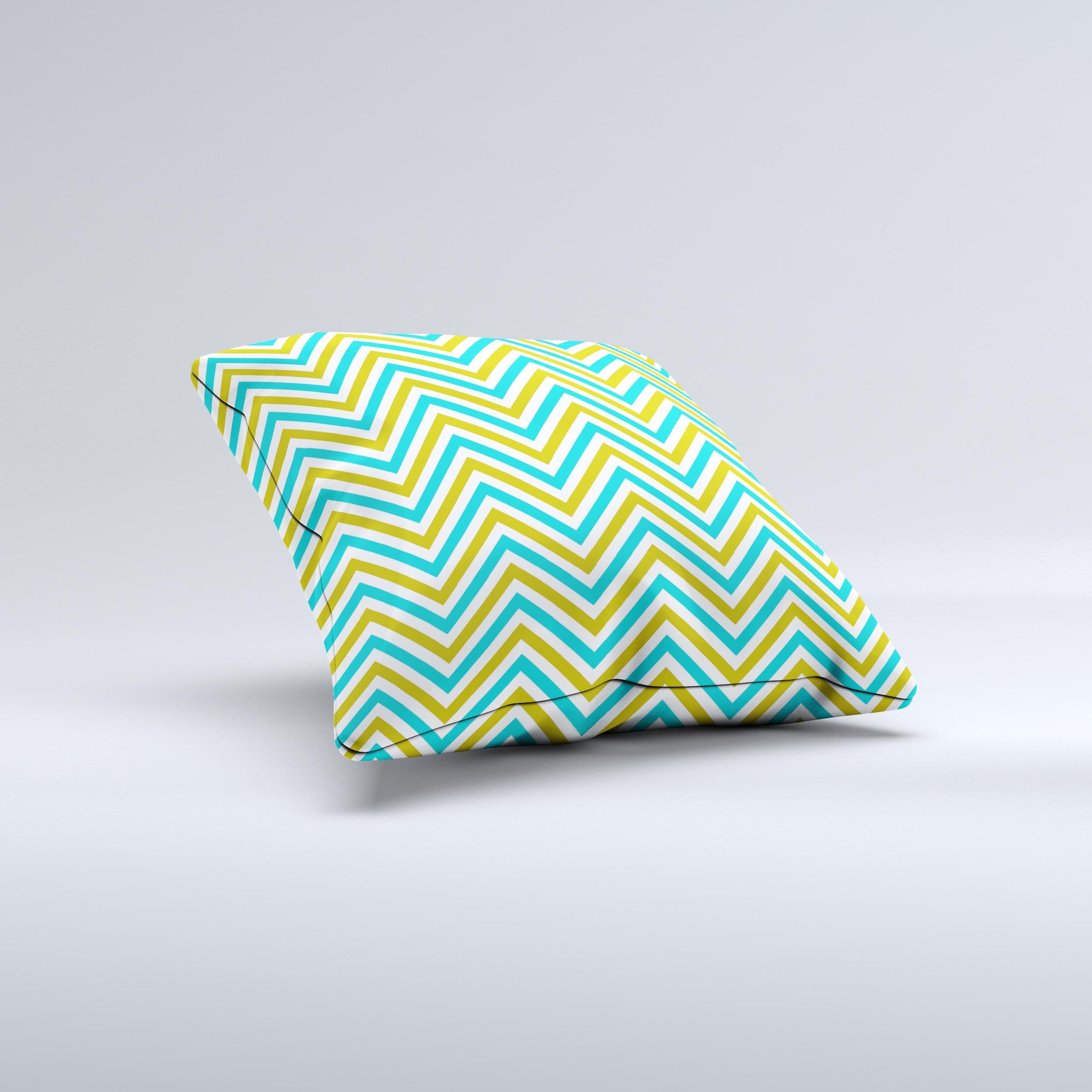 Gold and blue decorative throw pillow featuring a sharp chevron pattern, handcrafted in Virginia with high-quality materials.