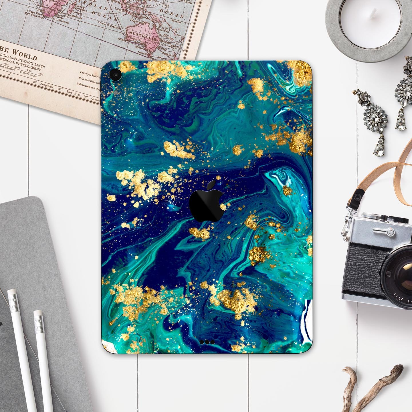 Gold Flaked Teal Oil skin decal for Apple iPad Pro, showcasing its elegant design and premium finish.