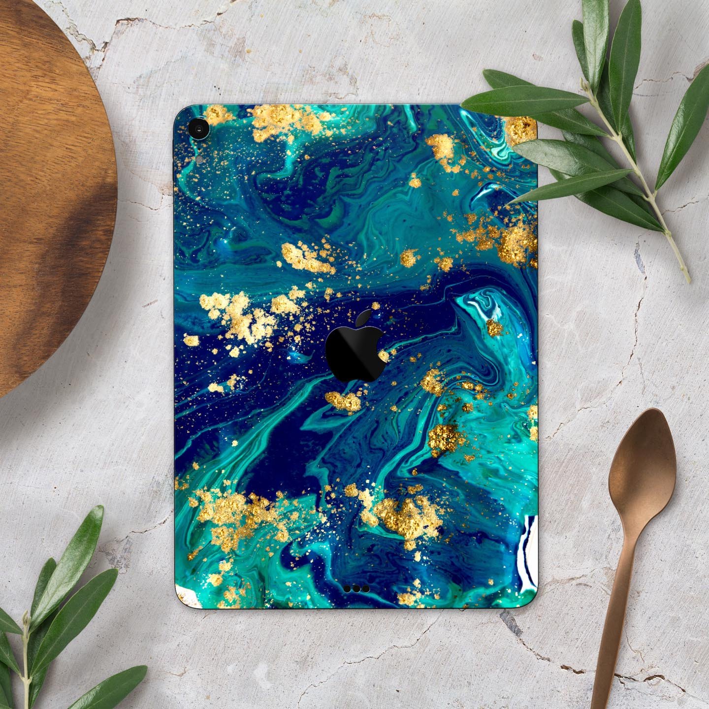 Gold Flaked Teal Oil skin decal for Apple iPad Pro, showcasing its elegant design and premium finish.