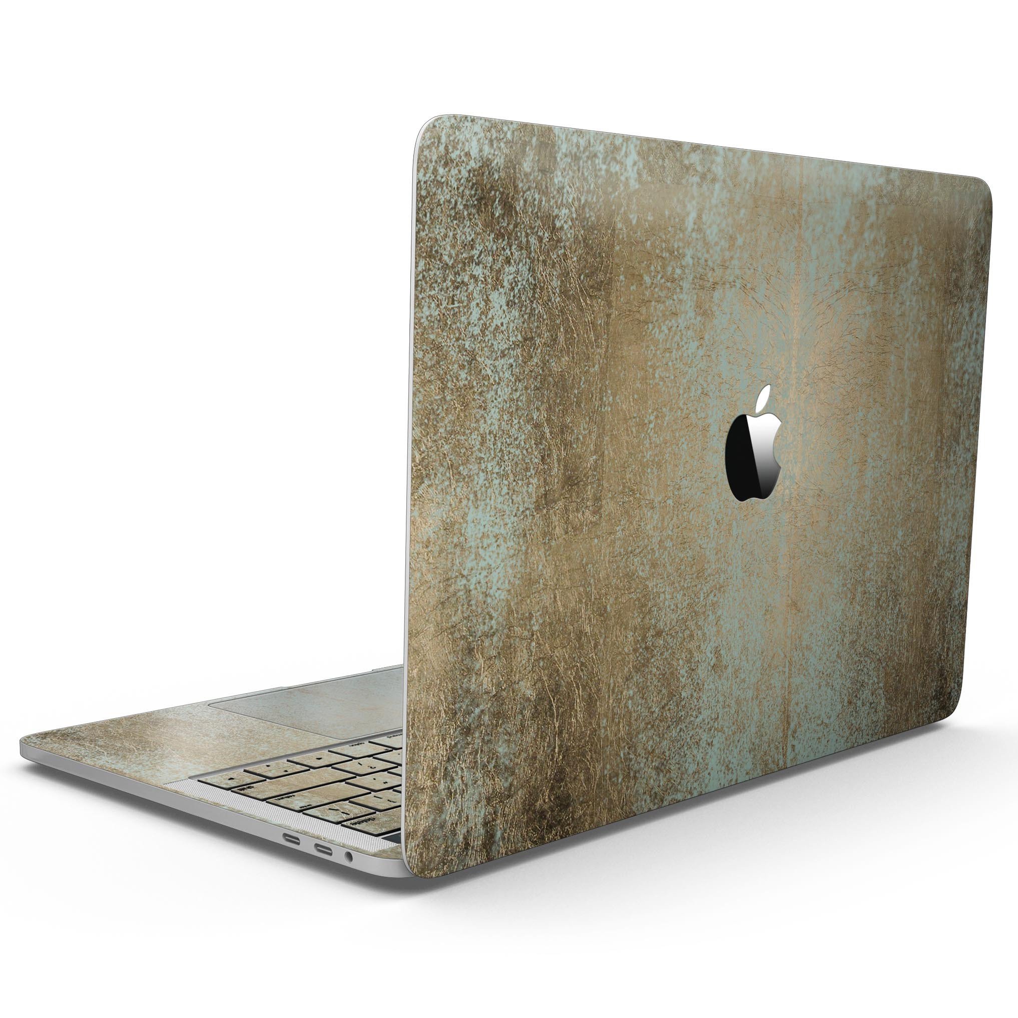 Gold Foiled Surface v1 Skin Kit for 13" MacBook Pro without Touch Bar, showcasing a stylish gold design on a sleek laptop.