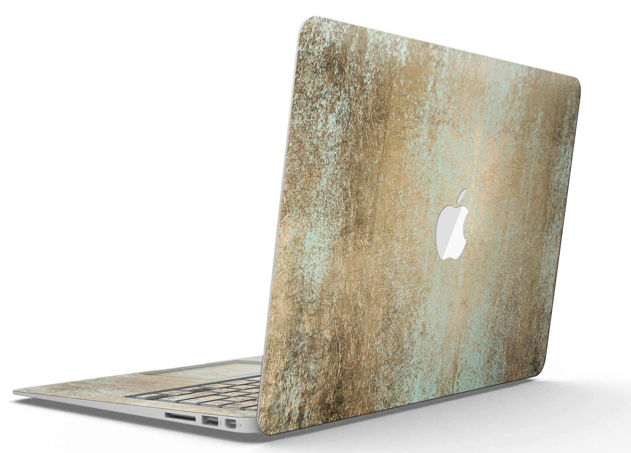 Gold Foiled Surface skin kit for MacBook Air, showcasing a stylish design that protects the device from scratches.